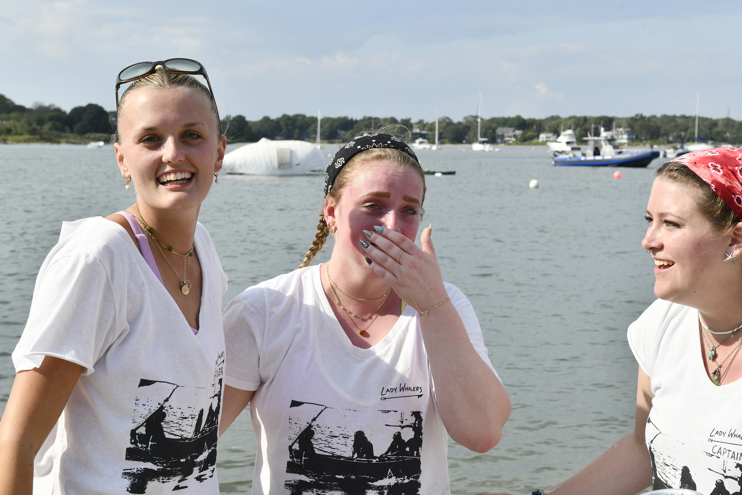 Lily Bradshaw, Maddie Martin and Kristen Pettigrew celebrate after their victory.   DANA SHAW