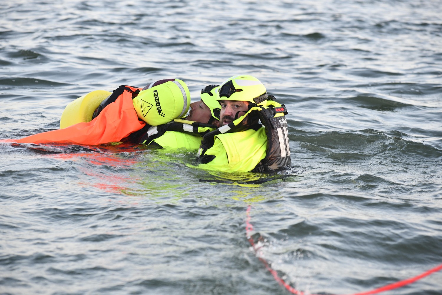 Southampton Fire Department Water Rescue Team members Alfred Callahan and Graham Fynes during a drill on September 23.  DANA SHAW