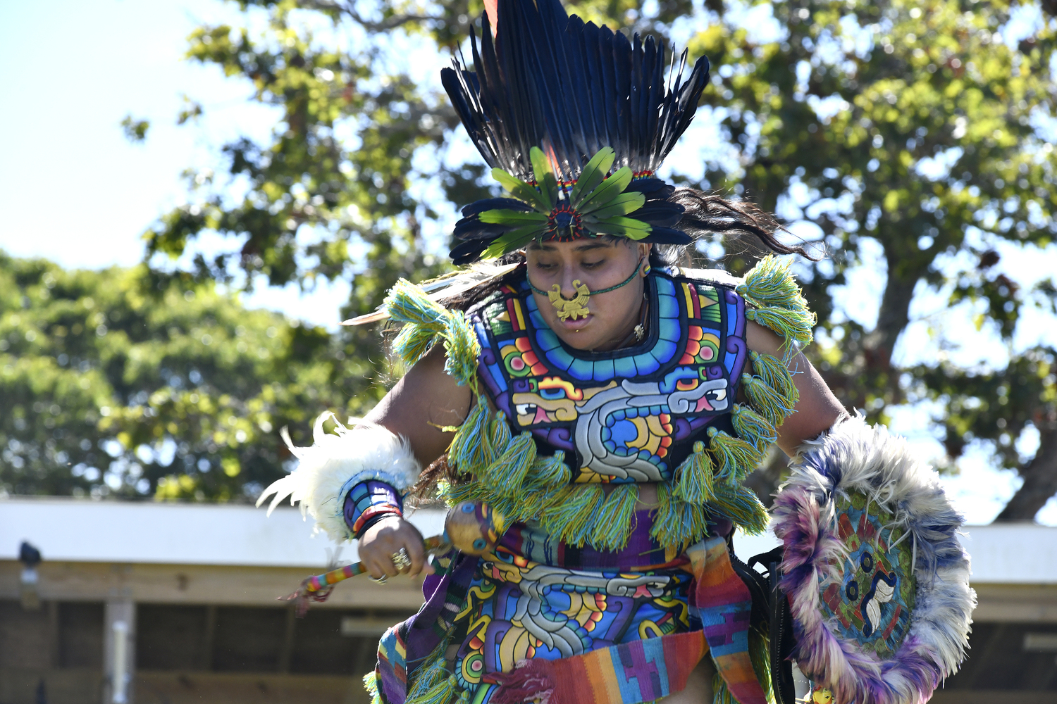 Kalpulli Huehuetlahtolli (Aztec Dancers) perform at the 79th annual Shinnecock Powwow on Saturday afternoon.