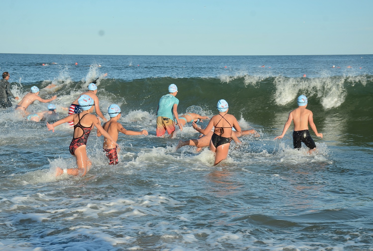 East Hampton Volunteer Ocean Rescue hosted its annual Red Devil Swim on Saturday at Atlantic Avenue Beach in Amagansett.  KYRIL BROMLEY