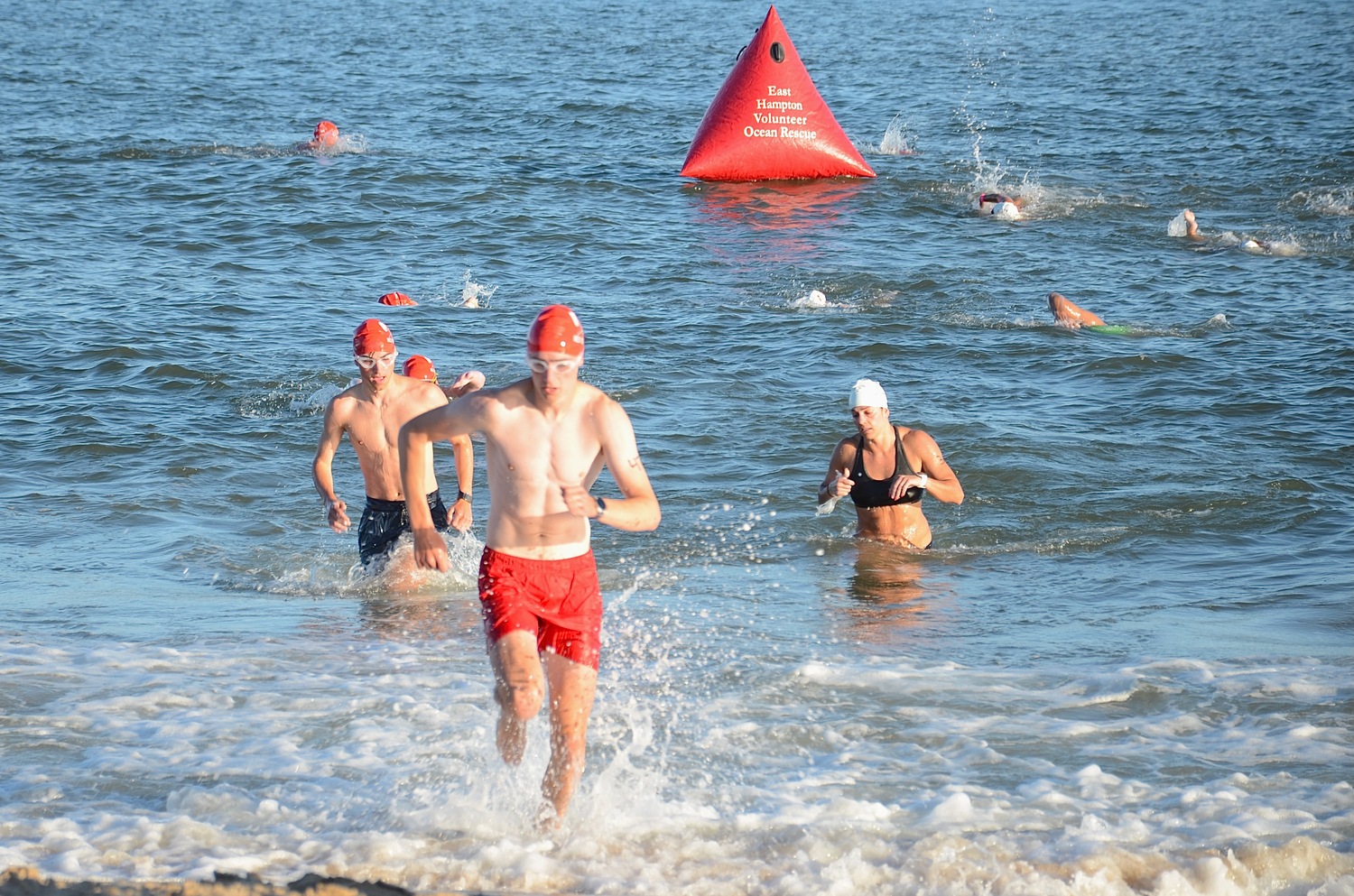 East Hampton Volunteer Ocean Rescue hosted its annual Red Devil Swim on Saturday at Atlantic Avenue Beach in Amagansett.  KYRIL BROMLEY