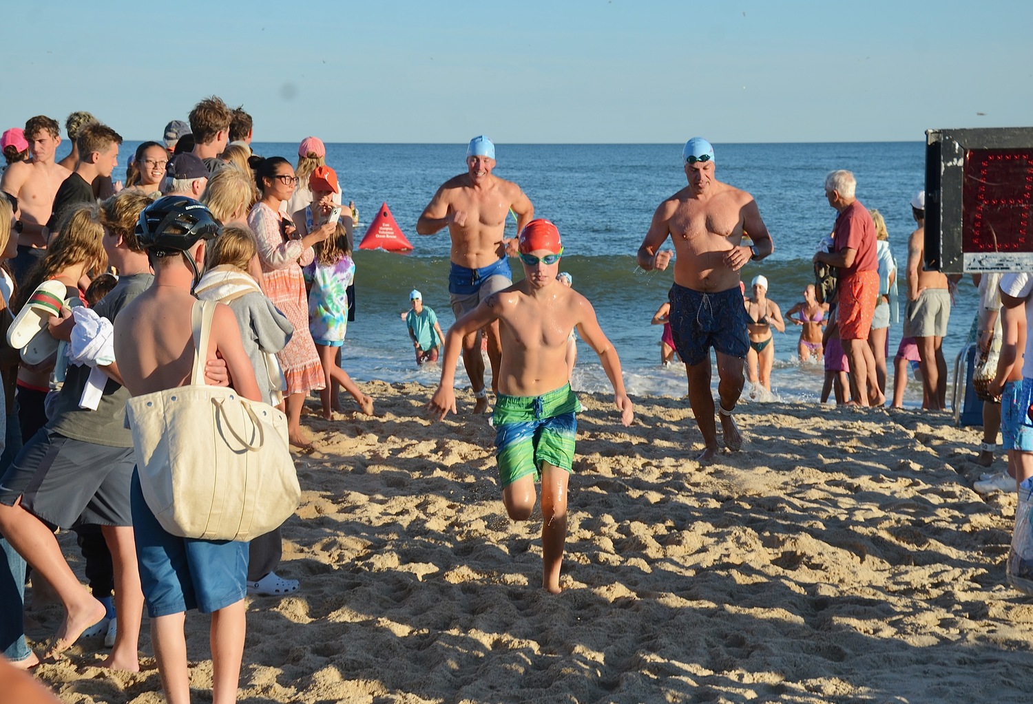East Hampton Volunteer Ocean Rescue hosted its annual Red Devil Swim on Saturday at Atlantic Avenue Beach in Amagansett.  KYRIL BROMLEY