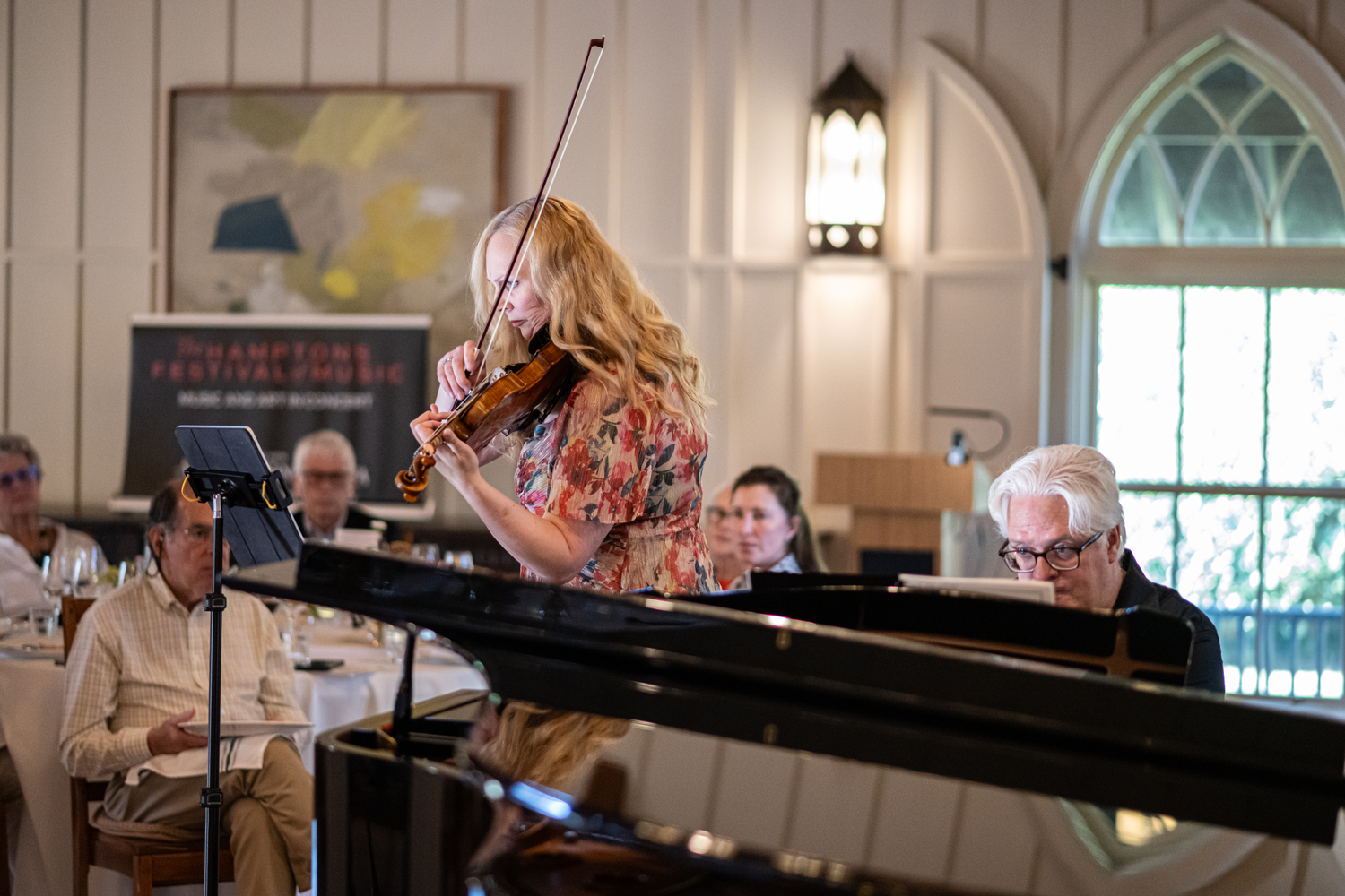 Violinist Annie Chalex Boyd and pianist David Palmer performing at TH·FM's “Tasting Notes”event at Hoie Hall on August 16. DANE DUPUIS