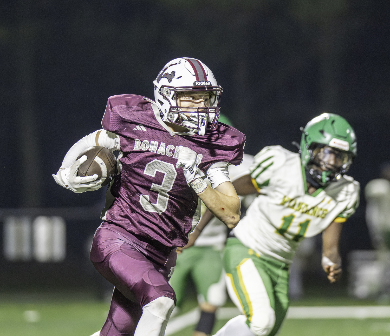 East Hampton junior Jackson Carney runs with the ball.  MARIANNE BARNETT