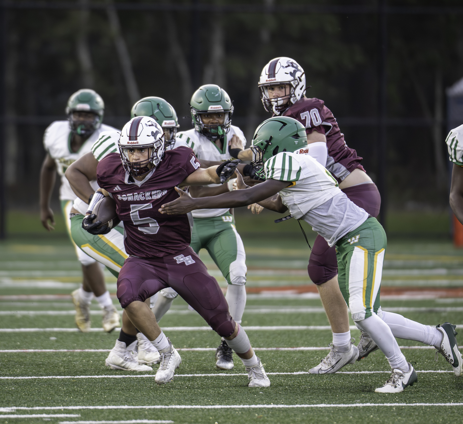 East Hampton junior Jackson Ronick looks to make a Wyandanch defender miss.  MARIANNE BARNETT