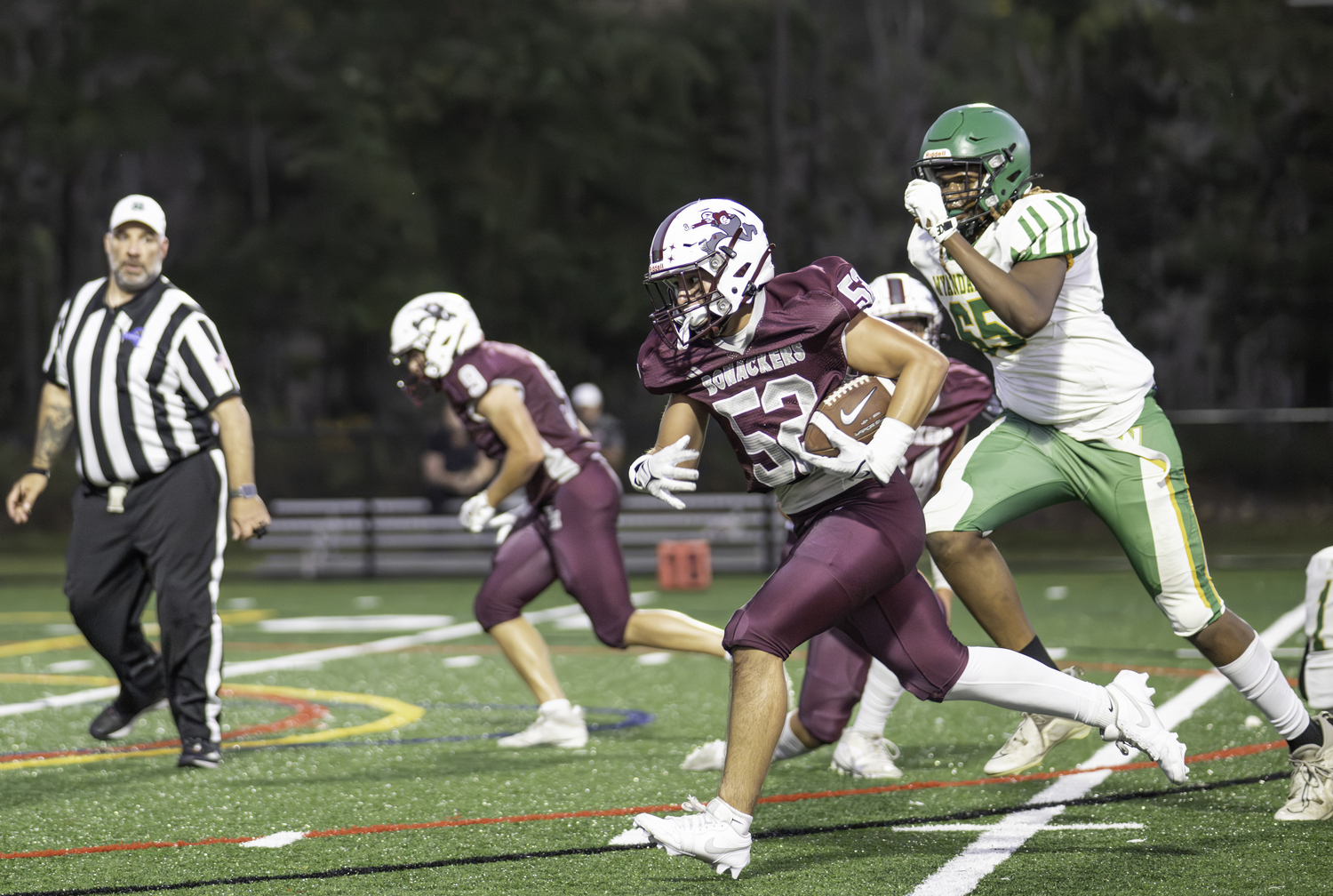 Bonac senior Jake Rivera took this interception into the end zone for a touchdown.  MARIANNE BARNETT