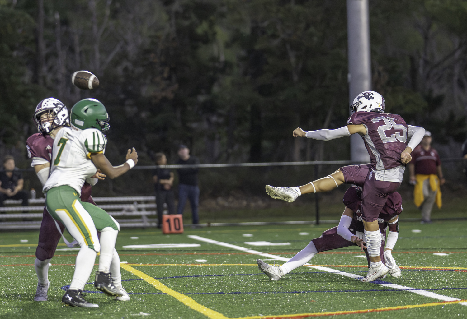 East Hampton senior Manny Morales successfully kicks an extra point. MARIANNE BARNETT