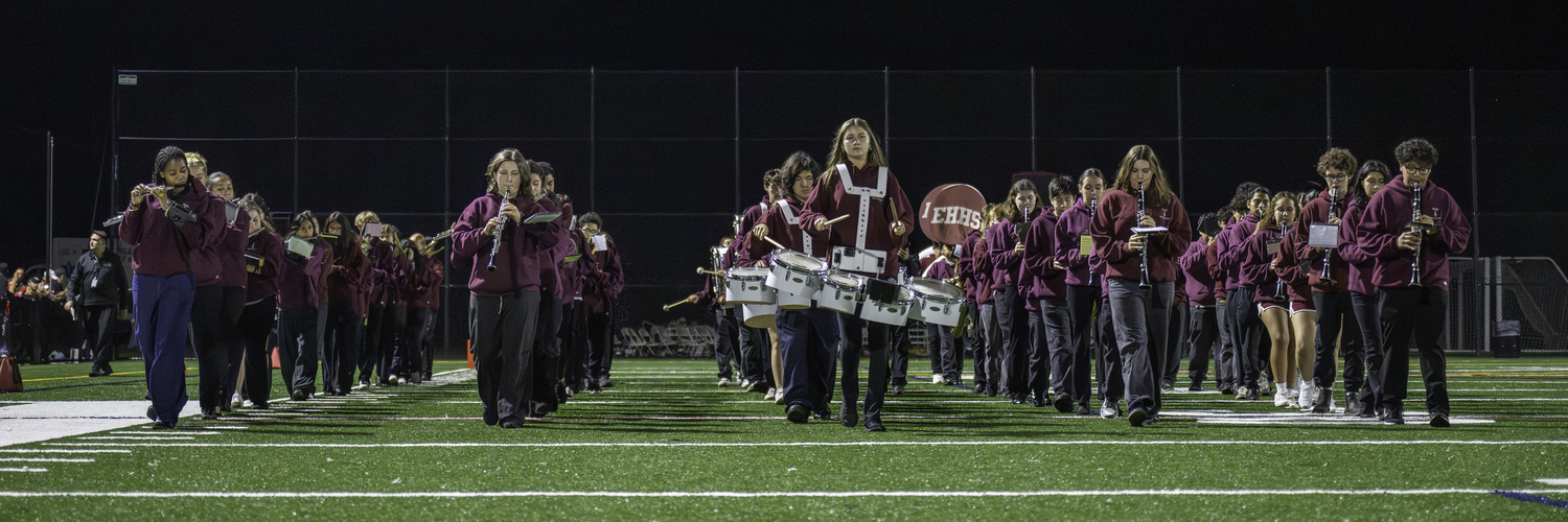 East Hampton's marching band plays at halftime of Friday night's homecoming game at the brand new facility on Stephen Hands Path in Wainscott.  MARIANNE BARNETT