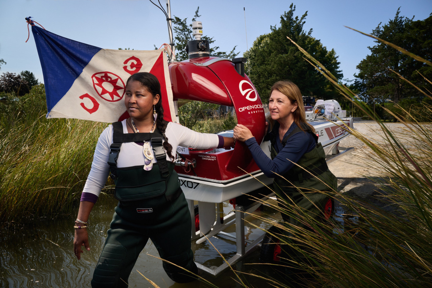 Sunshine Gumbs, left, and Dr. Ellen Pikitch launch The Shinnecock Hope Spot booth at the most recent Powwow over Labor Day weekend. People were invited to write down their hopes for Shinnecock Bay. SUNSHINE GUMBS into Shinnecock Bay. The vessel carried with it Expedition Flag #132 of the Explorers Club. FELIX KUNZE