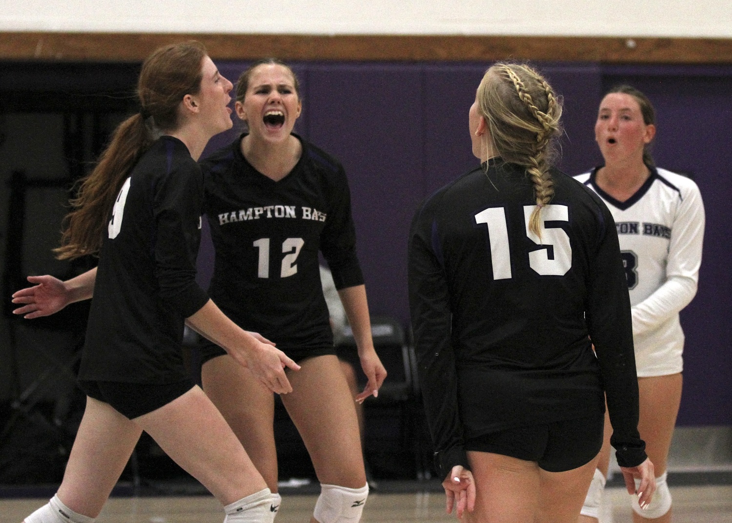 Shea Egan, Grace Drake, Taylor Meyers and Lilly Maffia celebrate a point. DESIRÉE KEEGAN