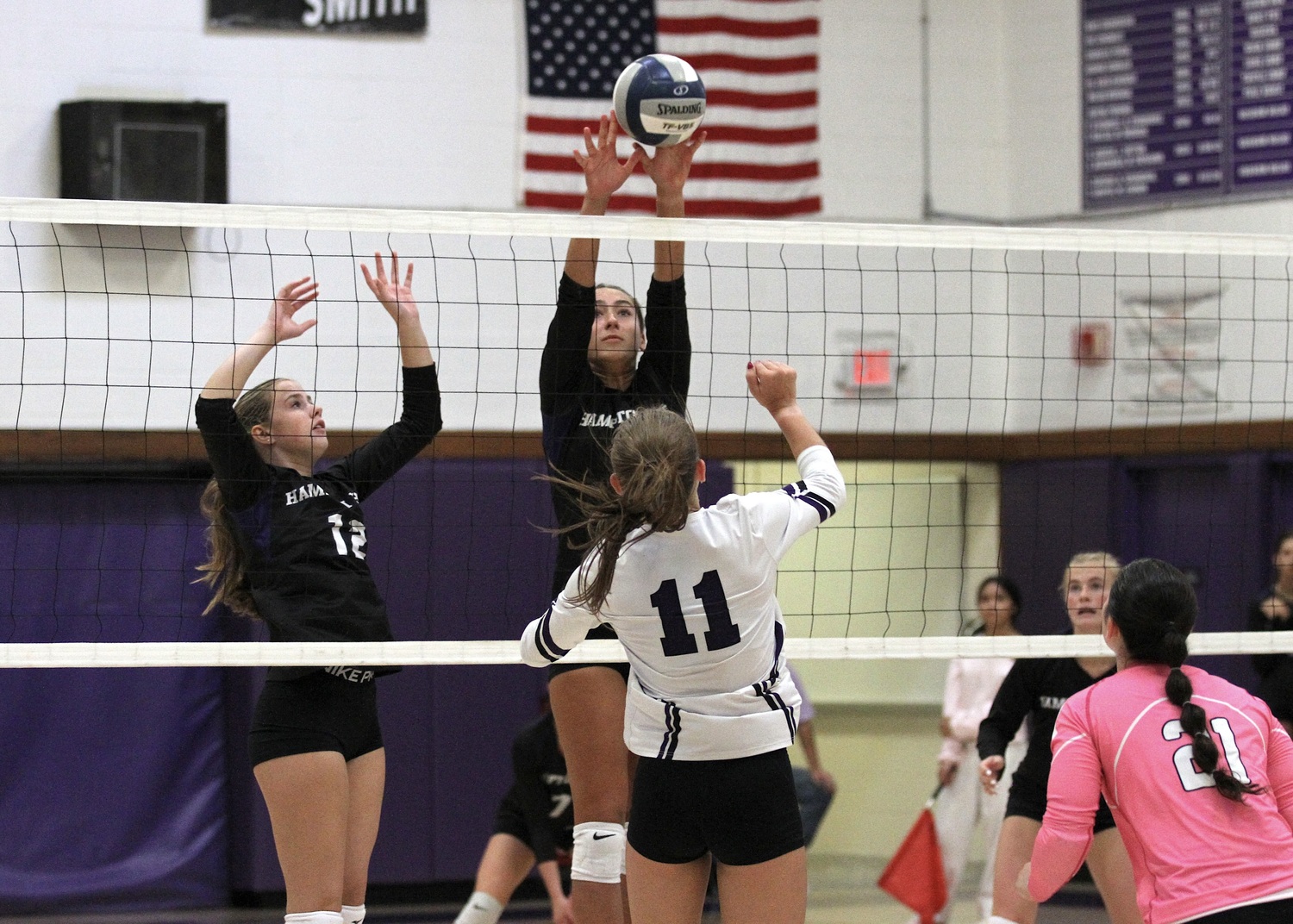 Junior middle blocker Kirra Schoerlin blocks the ball. DESIRÉE KEEGAN
