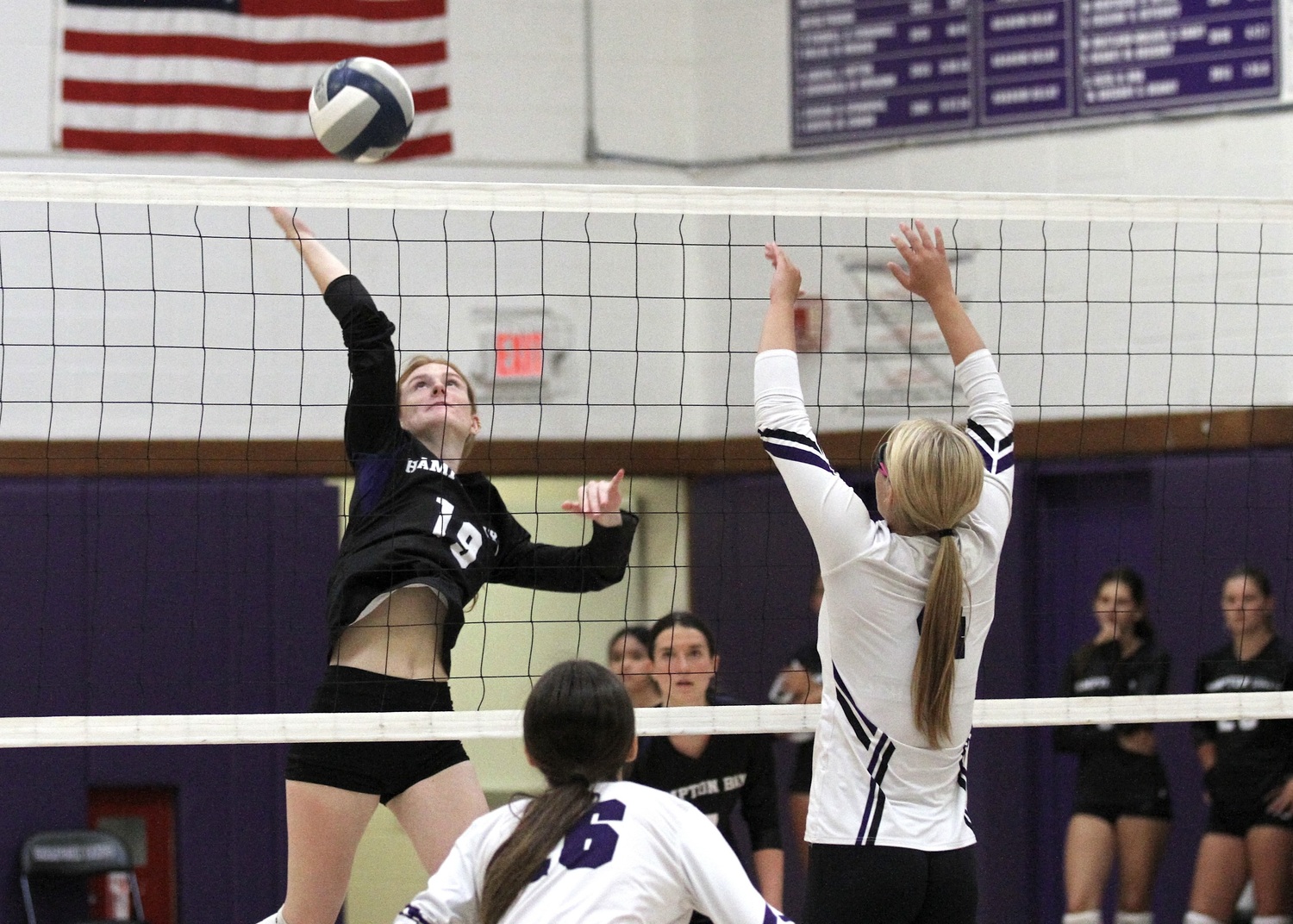 Senior middle blocker Shea Egan slams over a kill. DESIRÉE KEEGAN