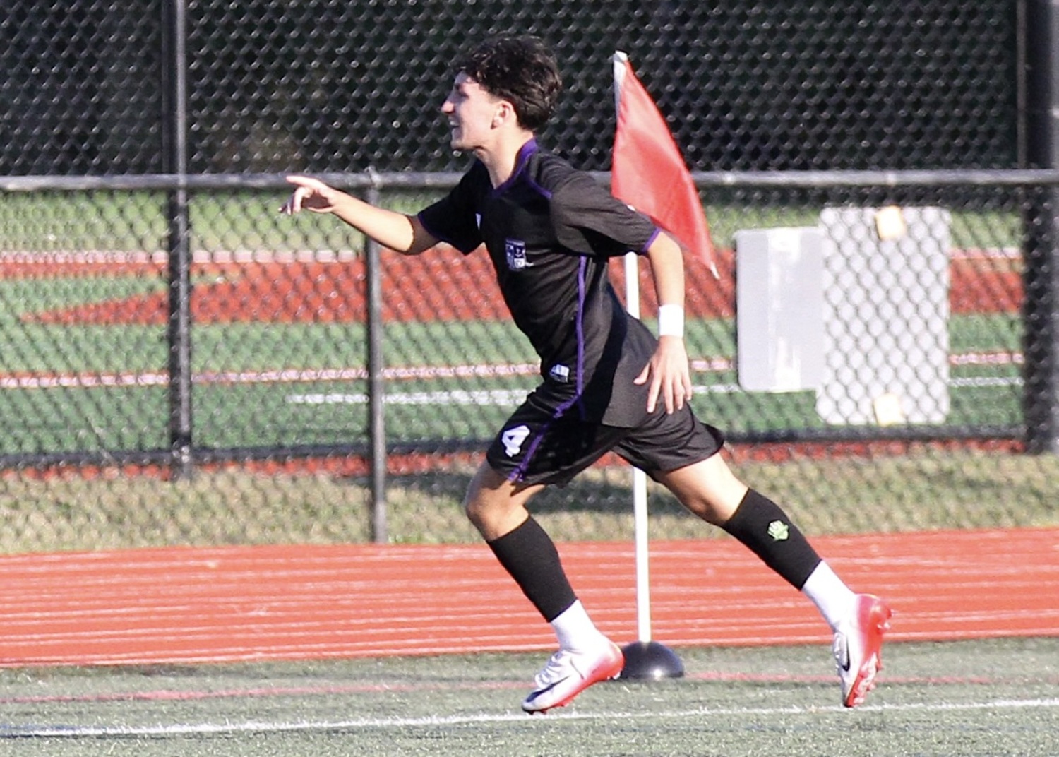 Senior Brandon Guevara celebrates his goal. DESIRÉE KEEGAN