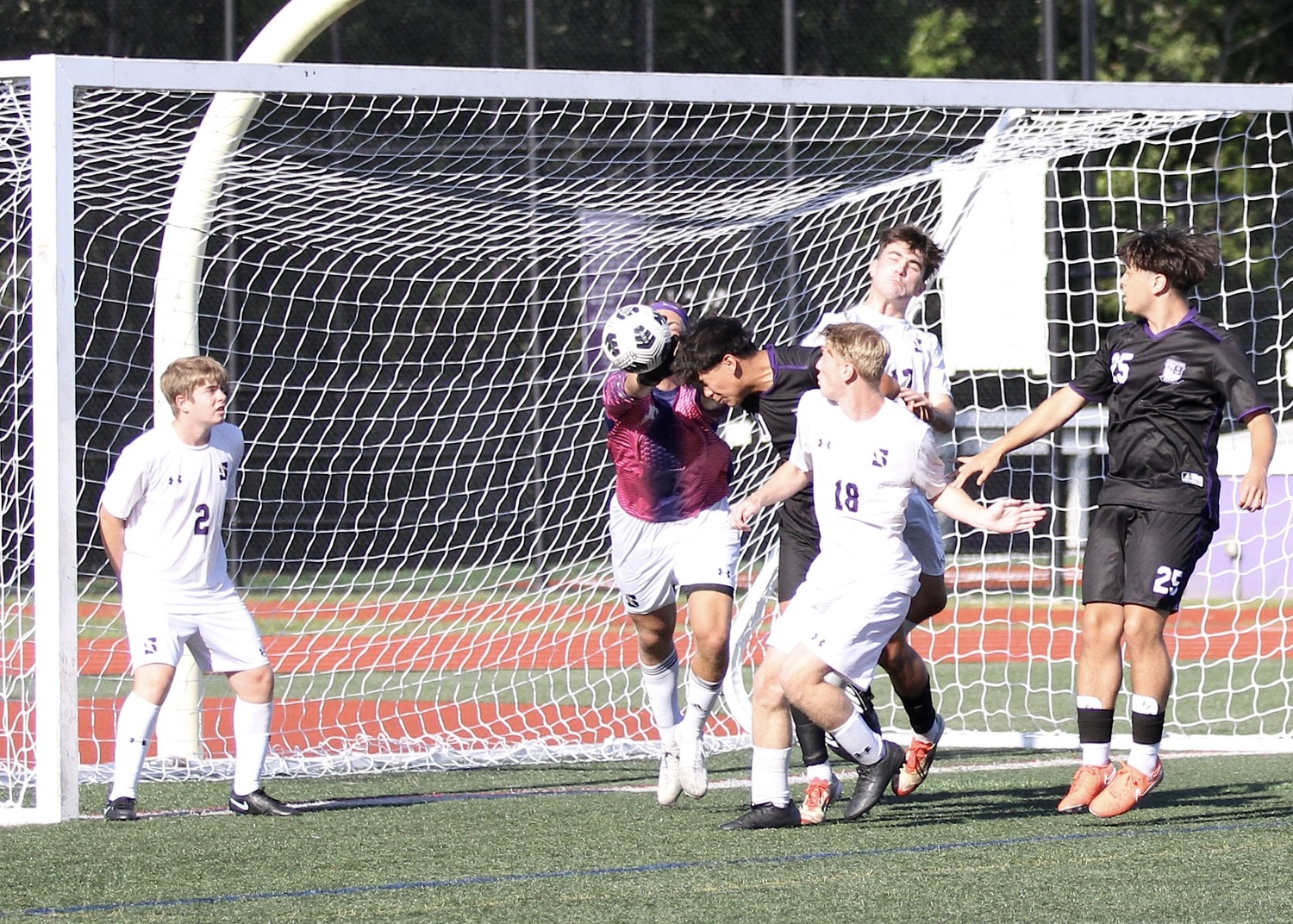 Senior captain Giorgio Sinchi heads the ball into the goal. DESIRÉE KEEGAN