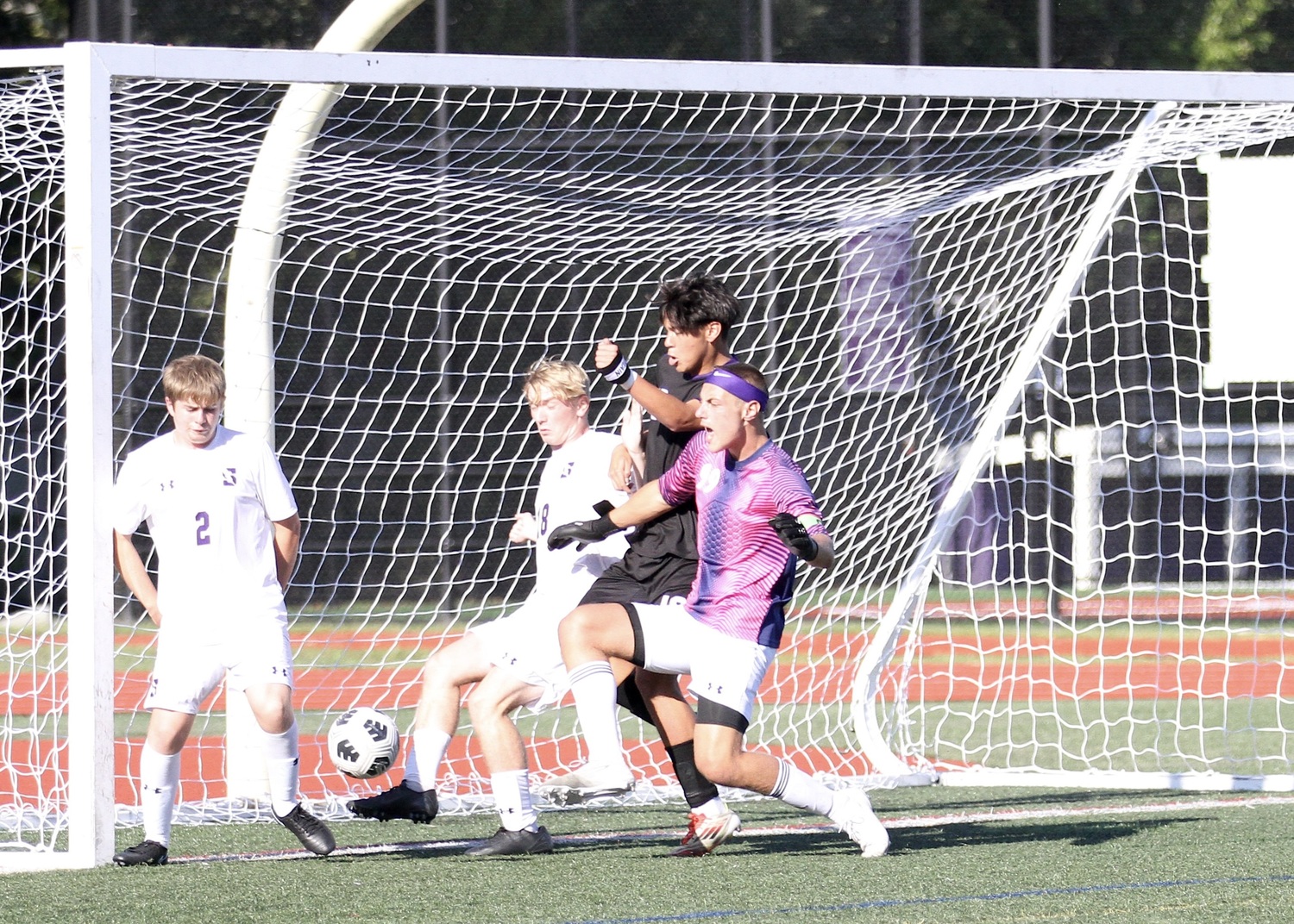 Senior Giorgio Sinchi battles for the ball in front of the goal. DESIRÉE KEEGAN