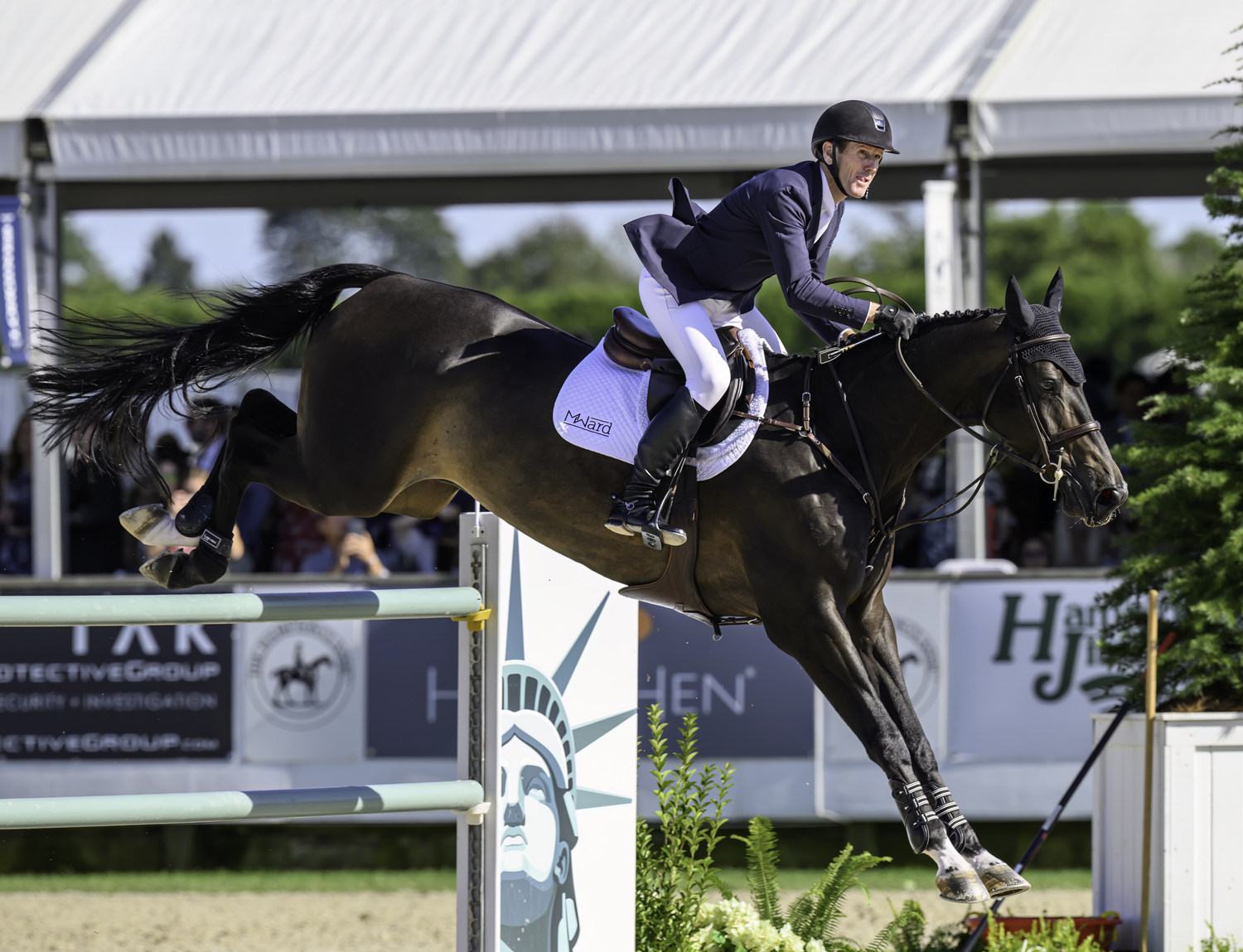 McLain Ward, ranked eighth in the world, checking his time on the Jumbotron, on Imperial HBF, a new mount for him.  MARIANNE BARNETT