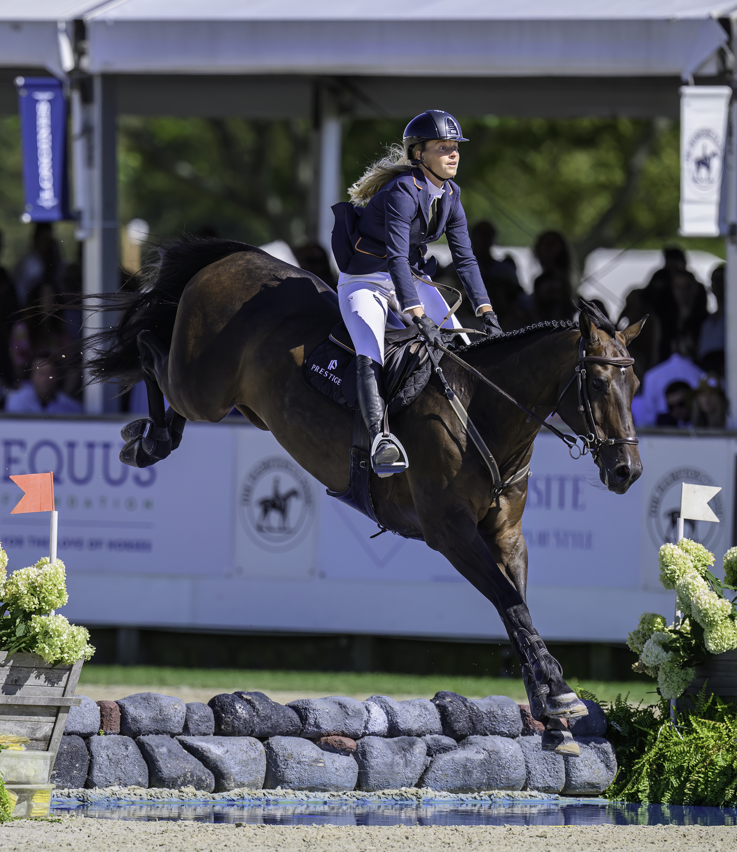 Kristen Vanderveen, ranked 40th in the U.S., was the first clear round after 20 riders.  MARIANNE BARNETT