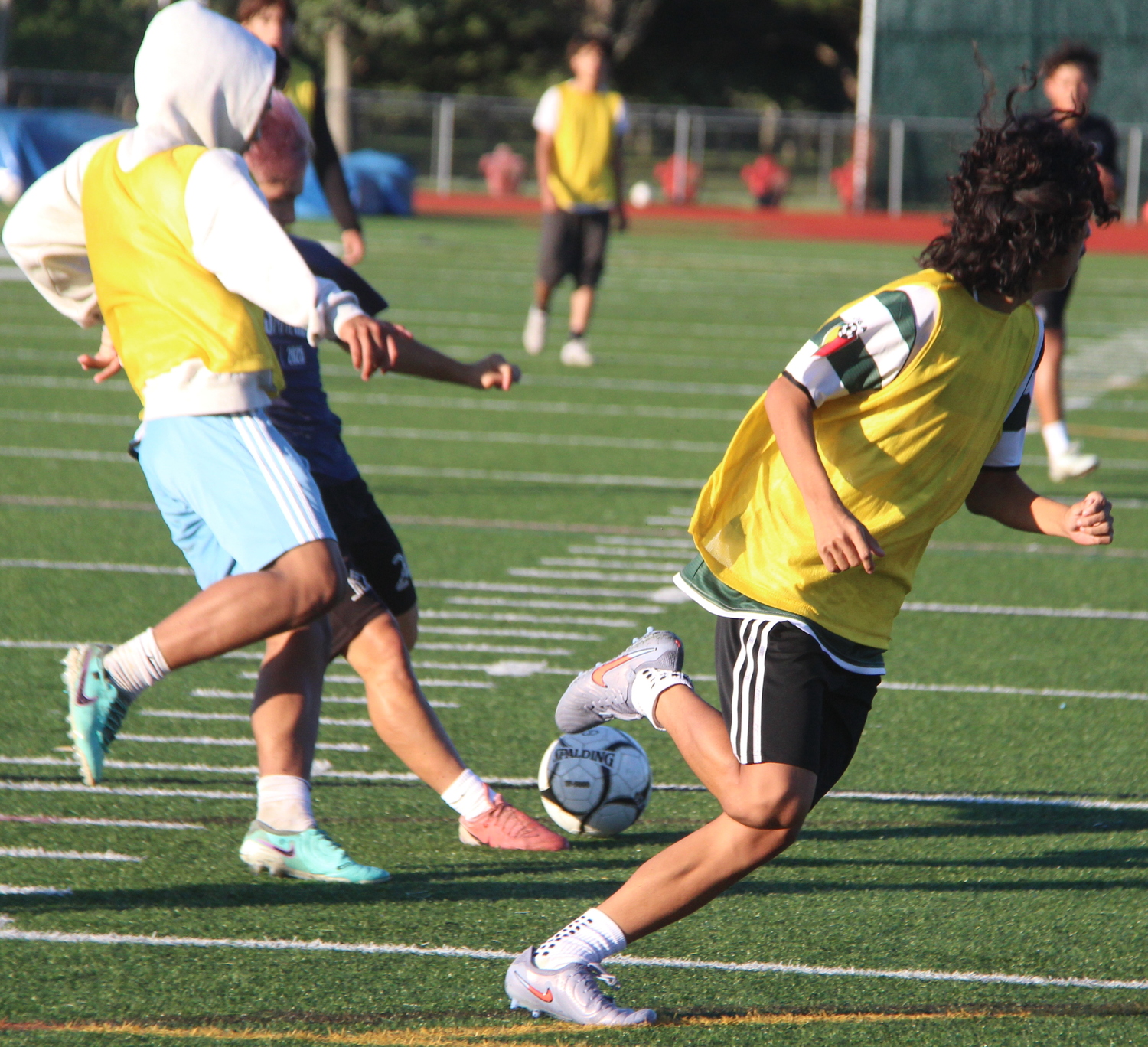 The East Hampton boys soccer team practicing on Saturday morning.  JACK GRAVES