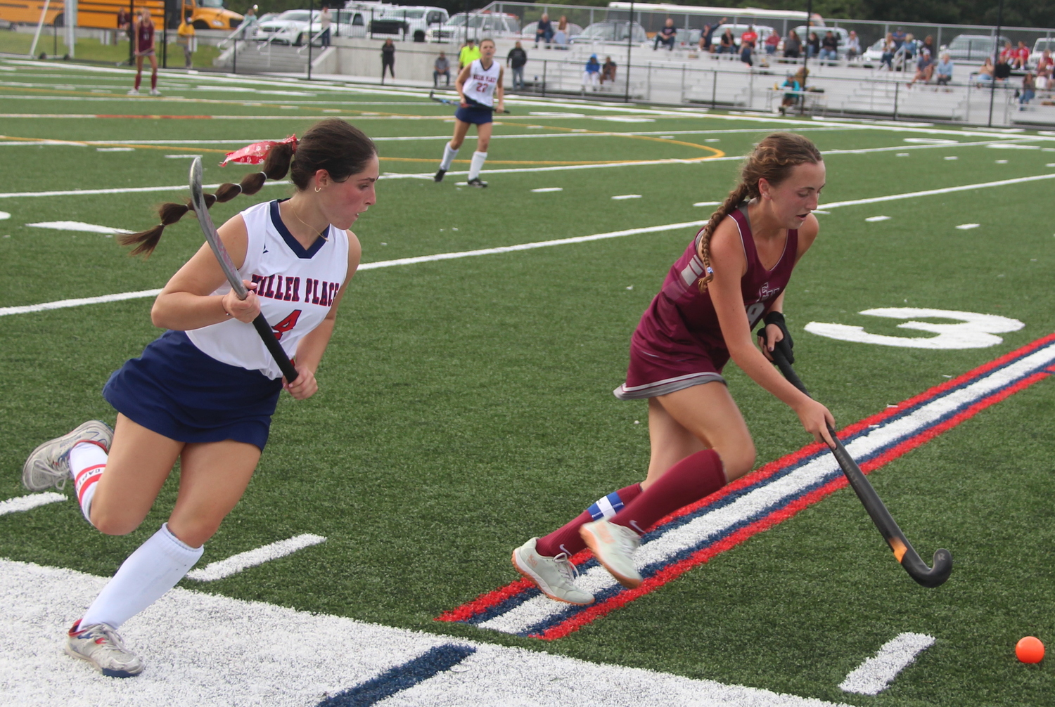 East Hampton's Hailey Welsch leaves behind Miller Place's Stella Musso.  JACK GRAVES