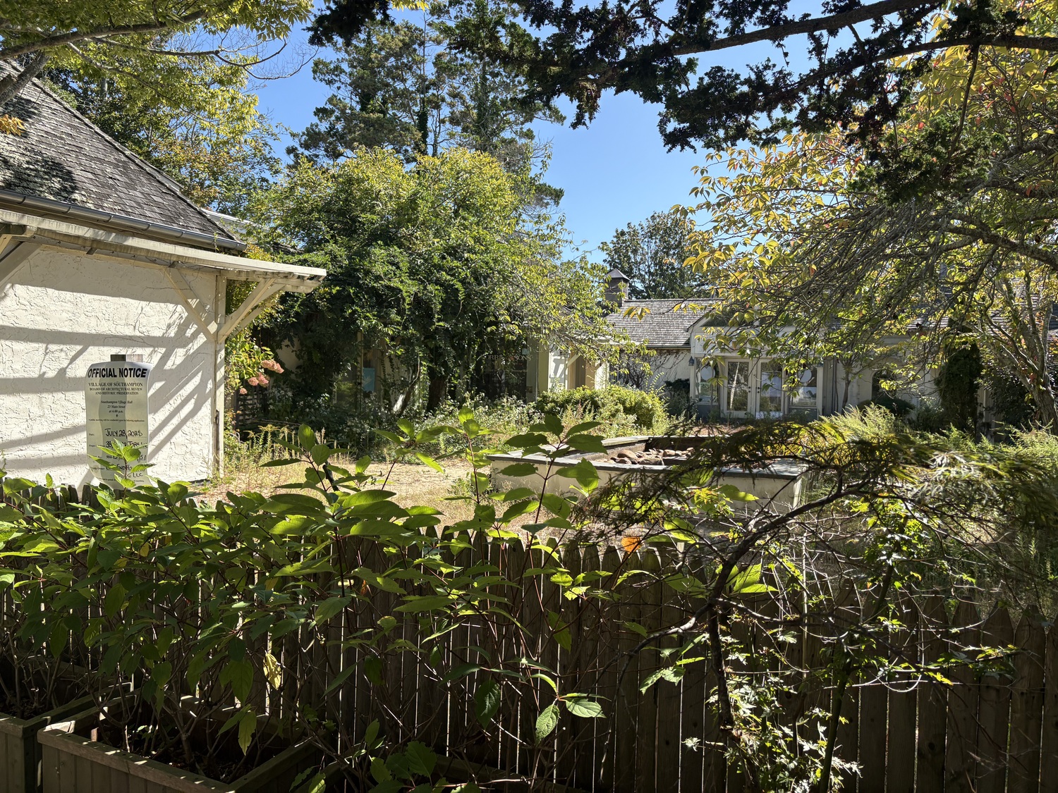 The overgrown and neglected Jobs Lane Court will soon be transformed into a new two-story building with shopfronts, designed by Siamak Samii, after a 4-1 vote in approval of the updated plans by the Southampton Village ARB on September 22. CAILIN RILEY