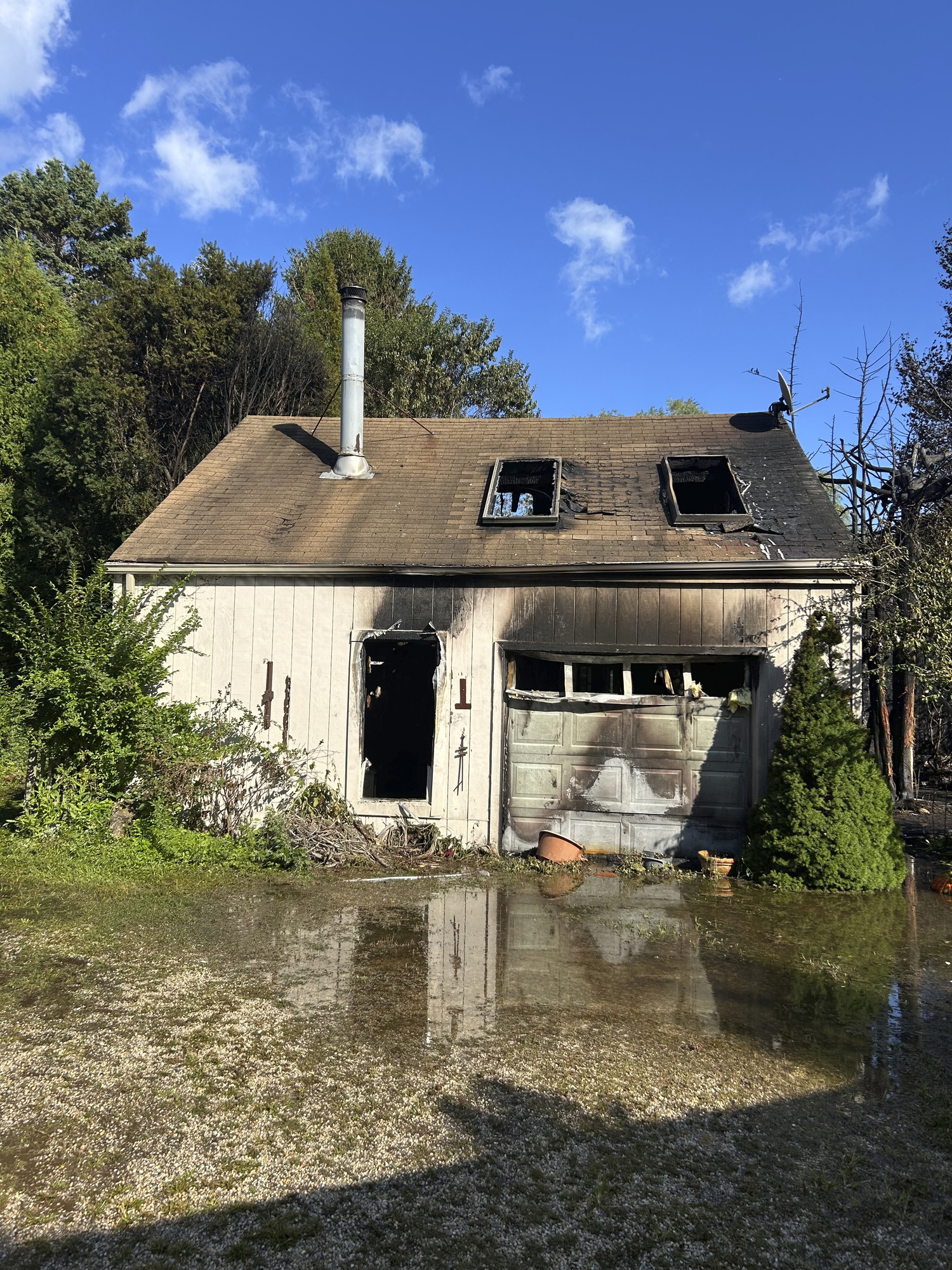 The aftermath of a house fire that left five people in Bridgehampton homeless on Friday. COURTESY BRIDGEHAMPTON FIRE DEPARTMENT