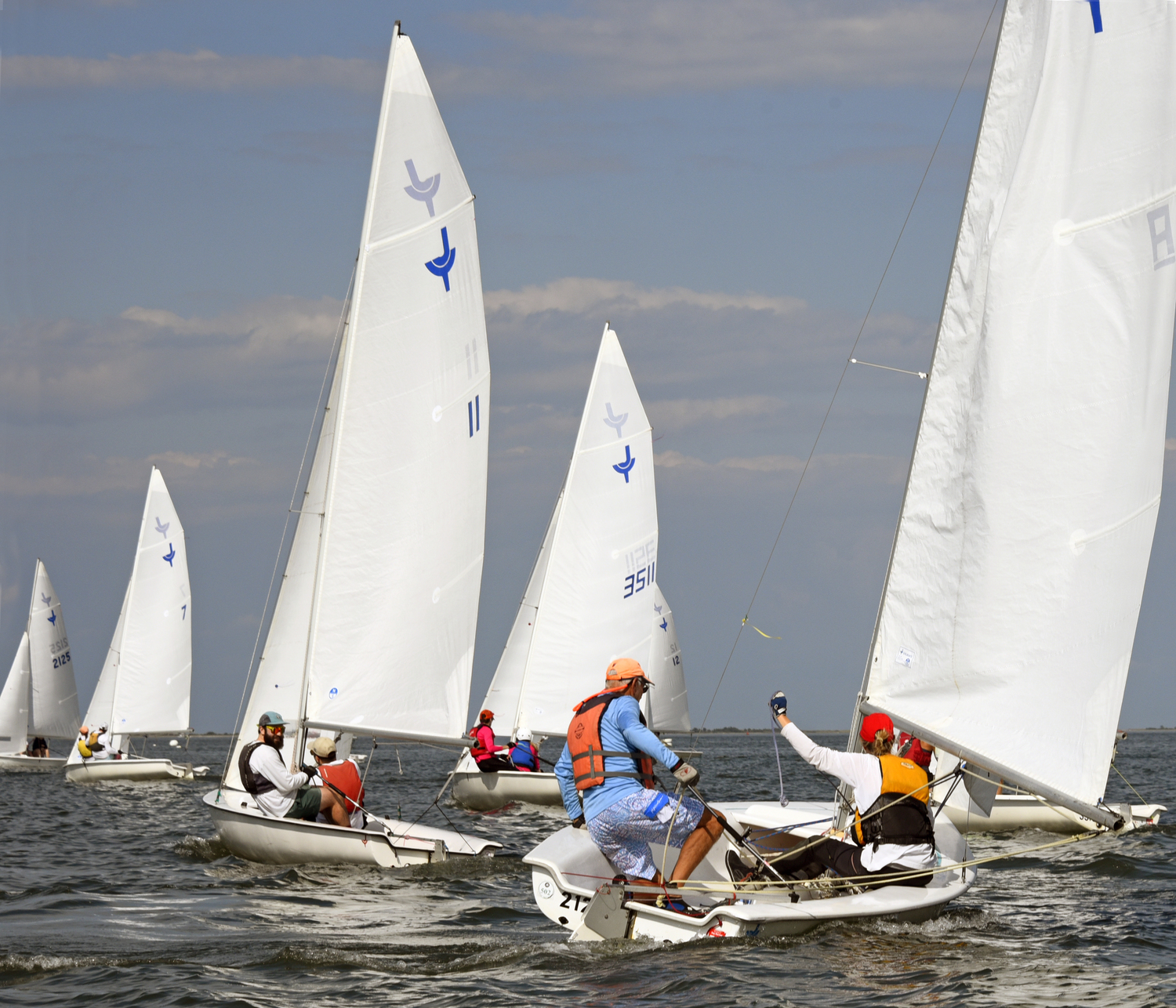 Left to right: Venetia Satow/Ava Kenny; Josh & Charlotte LeClue; Vidar Minkovsky/Nicholas Manfredi; Sinéad FitzGibbon/Jenn Theiss and Lee Oldak/Sarah Alford trimming to close-hauled after rounding the leeward mark.  MICHAEL MELLA