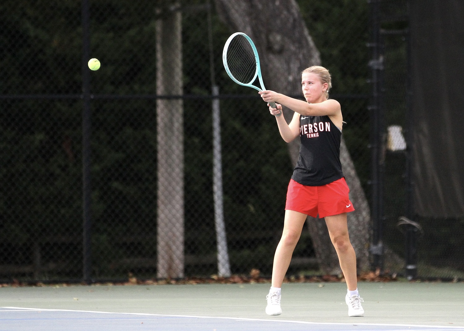 Senior Ally Cottrell rallies. DESIRÉE KEEGAN