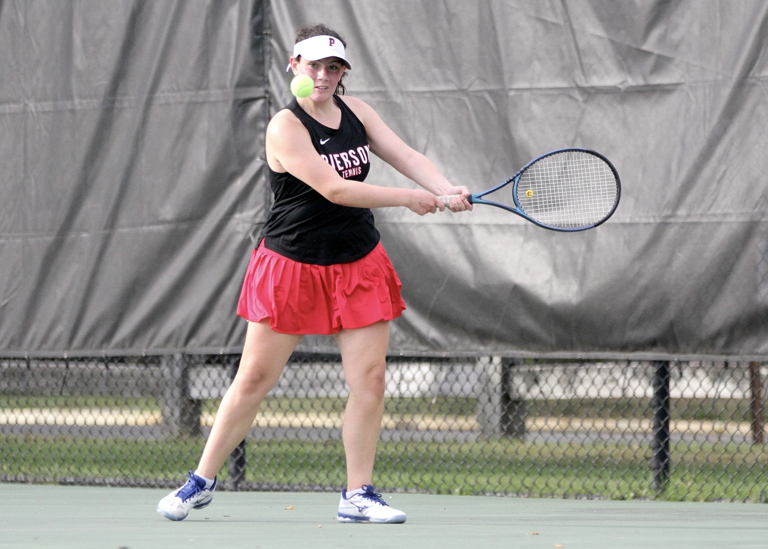 Eighth-grader Jade Glick keeps her eyes on the ball. DESIRÉE KEEGAN