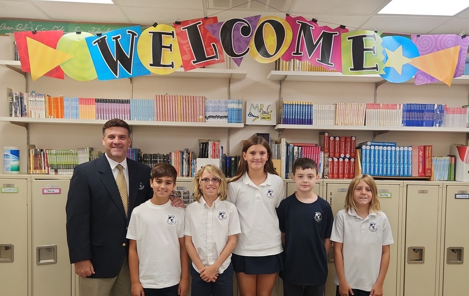Teacher Nick Cestare welcomes some members of the Raynor Country Day School Class of 2026 on their first day of school last week. COURTESY RAYNOR COUNTRY DAY SCHOOL