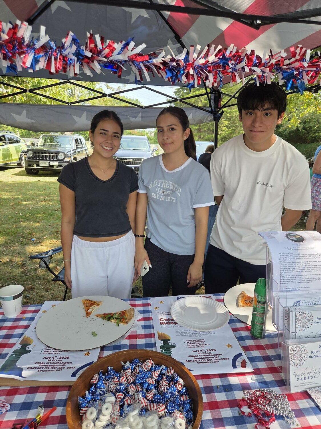 Members of Southampton High School’s Mariners Patriot Club, including from left,   Angelina Pino, Ashley Rios Castro and Kevin Lopez Urbano, were on hand at the Water Mill Classic Car Expo on September 6, connecting with the community and sharing
information about upcoming events that support local veterans. Among them are the  Veterans Appreciation Dinner on October 29 and the 200 Turkeys for 200 Veterans program in November. The club’s outreach helped raise awareness of these initiatives and provided opportunities for community members to give back to those who have served. COURTESY SOUTHAMPTON SCHOOL DISTRICT