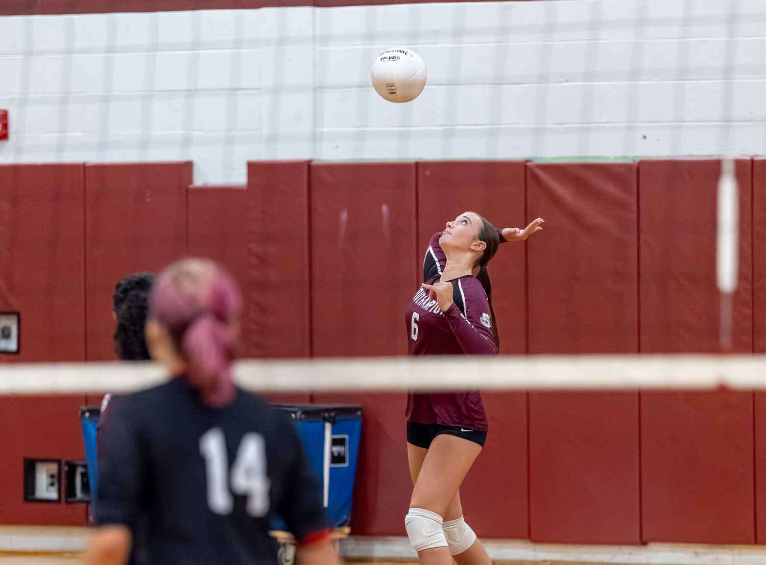 Southampton freshman Willow Ingram serves.  RON ESPOSITO