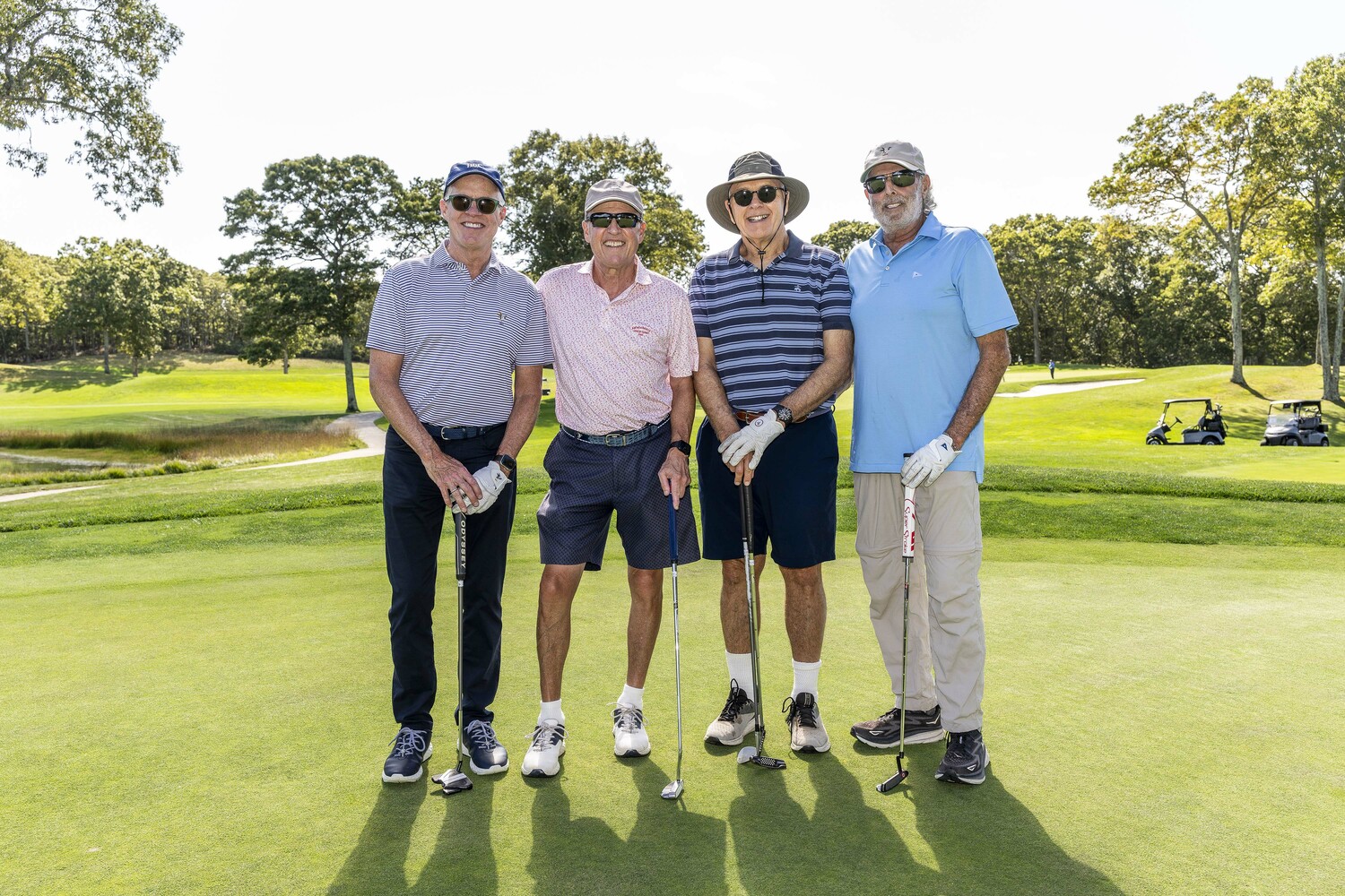 Kevin White, Alex Frank, Nick Sakellariadis and Steve Bergerson enjoyed a beautiful fall day at Noyac Golf Club in support of The Retreat at its annual golf outing on September 22.  JIM LENNON