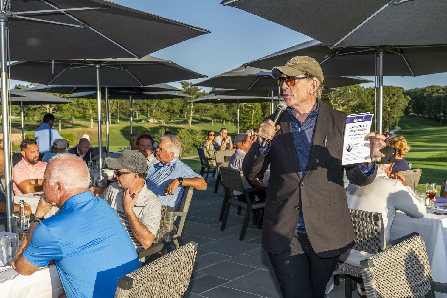 William McCuddy served as auctioneer at The Retreat’s Annual Golf Outing on September 22.  JIM LENNON