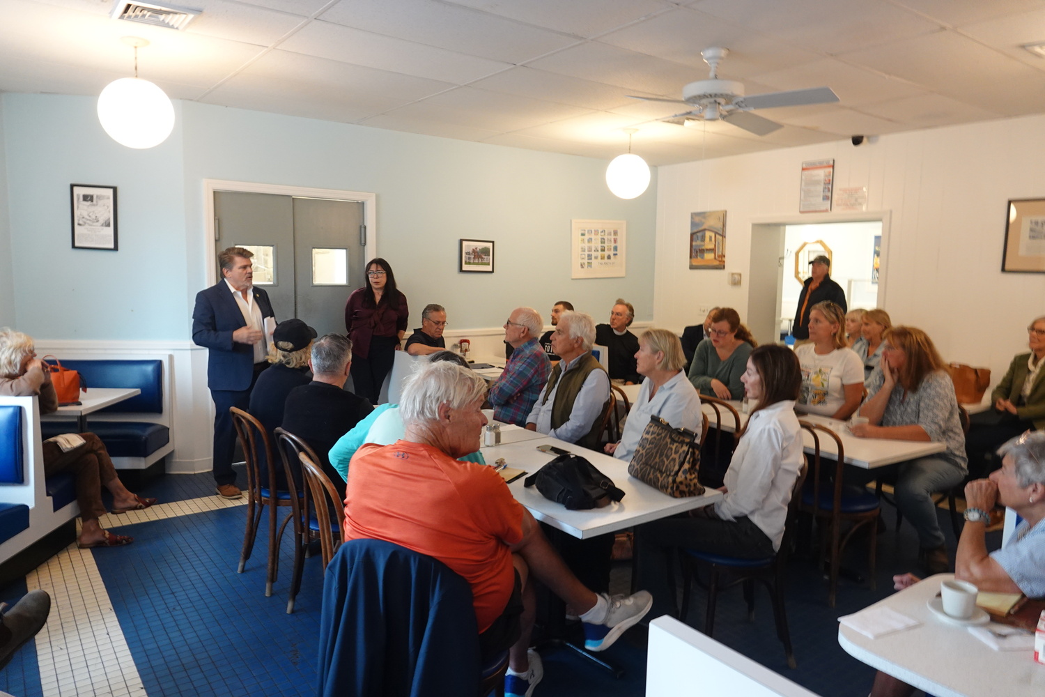 Bridgehampton business owners and residents gathered at the Candy Kitchen on Tuesday morning to discuss what can be done about the town having removed the trash cans from the hamlet's downtown. New York State Assemblyman Tommy John Schiavoni said that state law requires that the town maintain the right-of-way on state roads, but that it is up to the Southampton Town Board to decide what that maintenance entails. MICHAEL WRIGHT