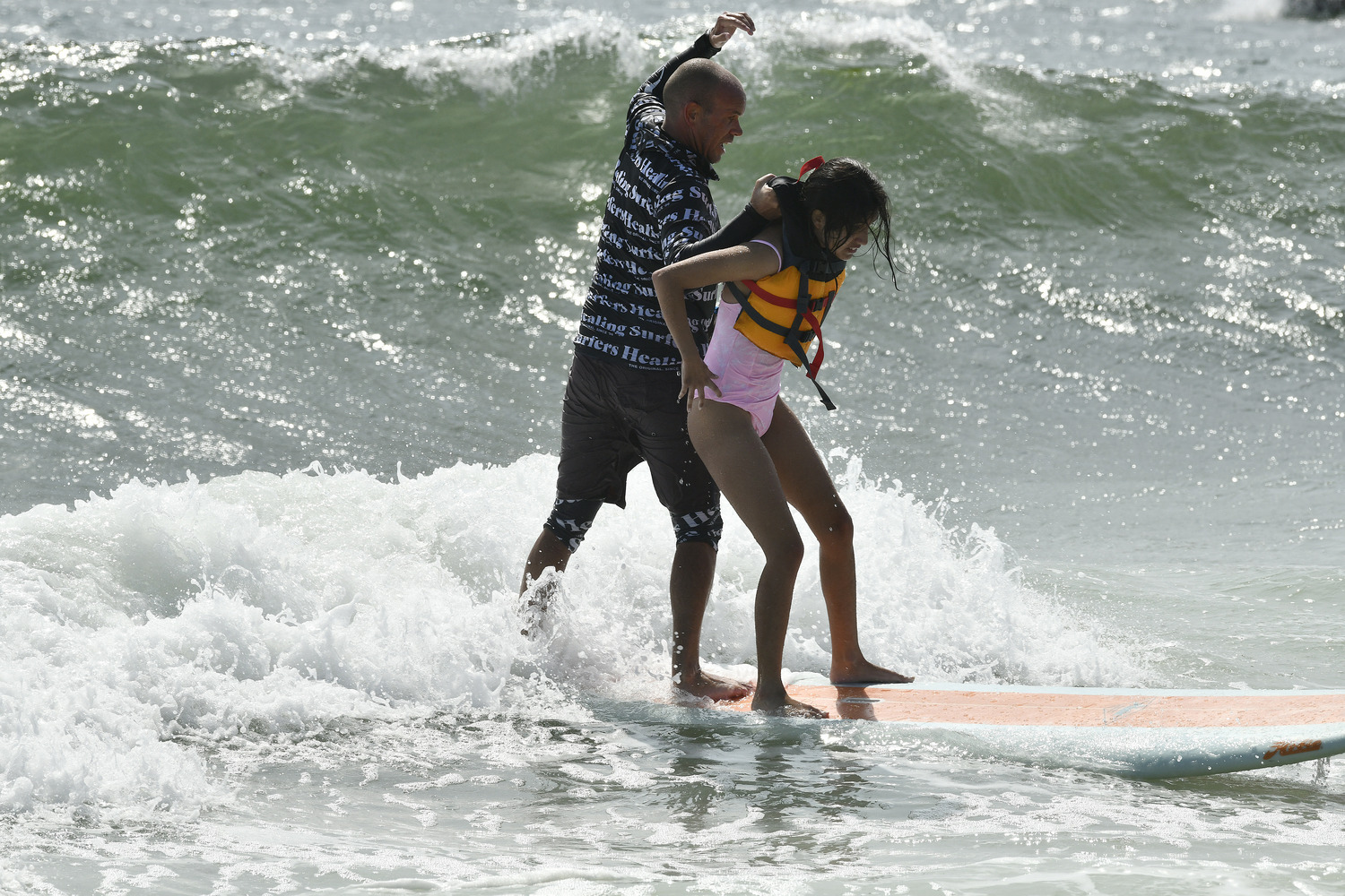 Surfers Healing was at Ponquogue Beach in Hampton Bays on September 9. The mission of Surfers Healing is to enrich the lives of people living with autism by exposing them to the unique experience of surfing.  DANA SHAW