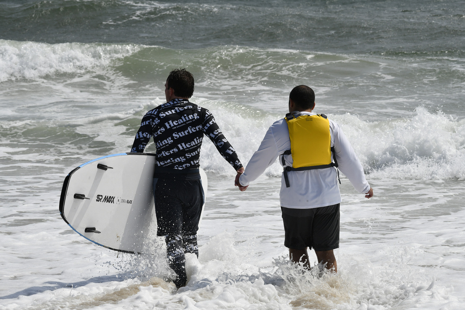 Surfers Healing was at Ponquogue Beach in Hampton Bays on September 9. The mission of Surfers Healing is to enrich the lives of people living with autism by exposing them to the unique experience of surfing.  DANA SHAW
