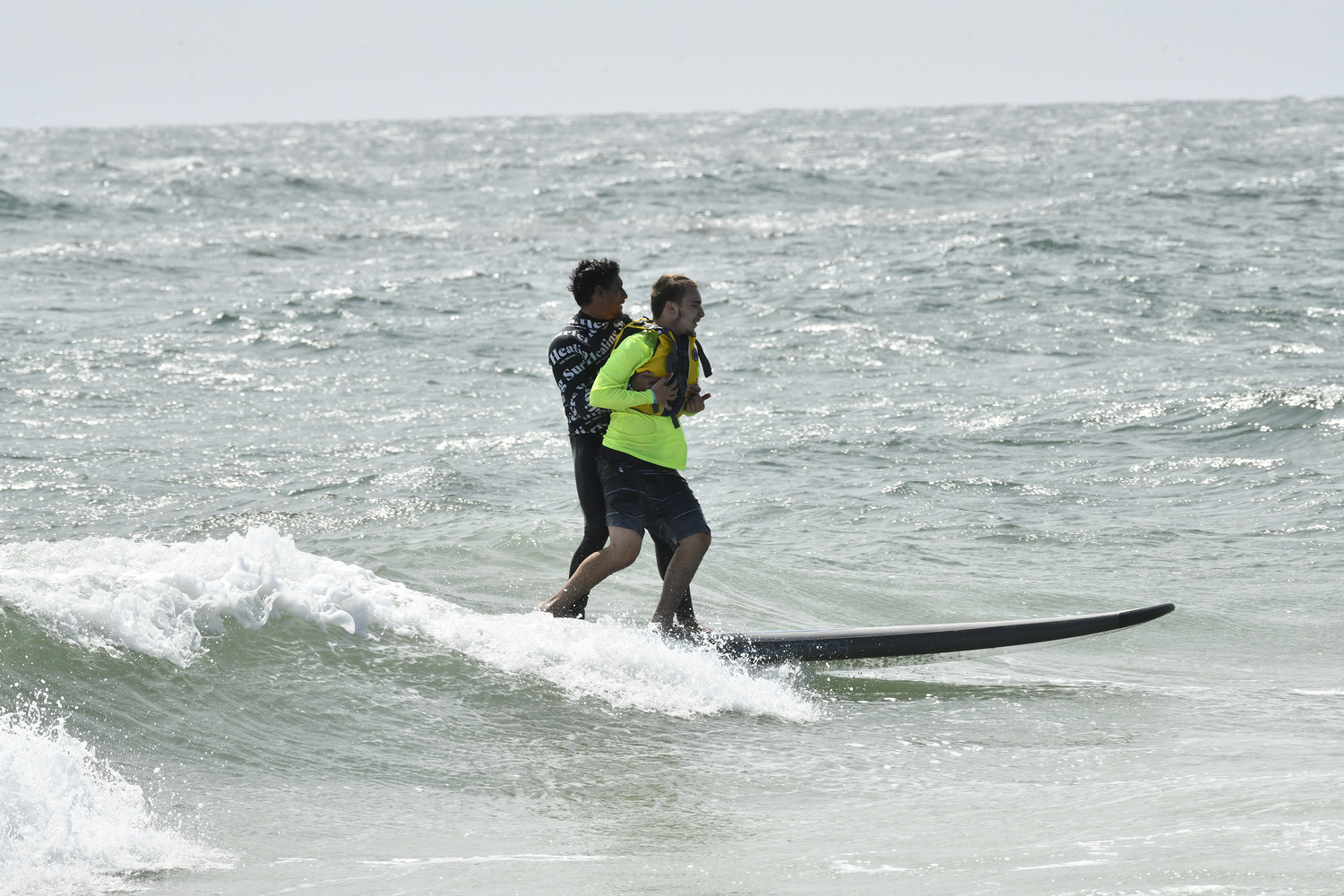 Surfers Healing was at Ponquogue Beach in Hampton Bays on September 9. The mission of Surfers Healing is to enrich the lives of people living with autism by exposing them to the unique experience of surfing.  DANA SHAW