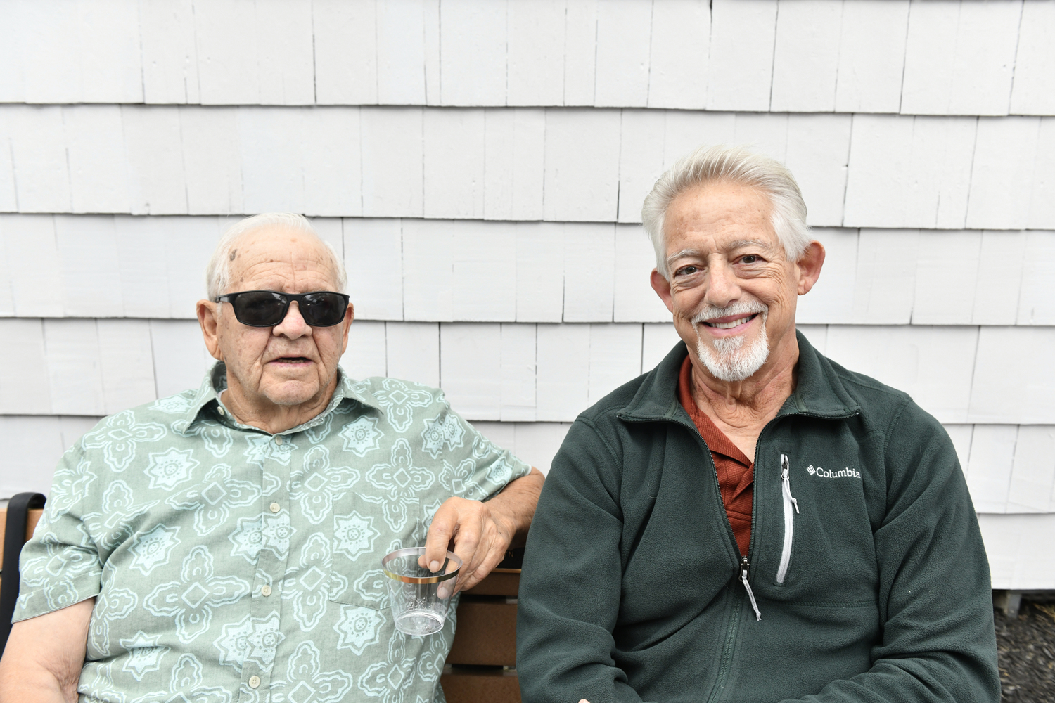 John Berlin and Richard Pandolfo at the Hampton Bays Historical Society end of the summer cocktail party at the Lyzon Hat Shop on Friday evening.  DANA SHAW