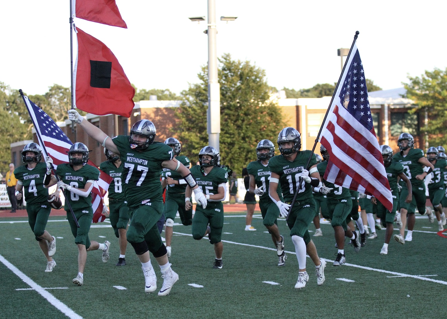 The 2025 Westhampton Beach football team takes the field for the first time. DESIRÉE KEEGAN