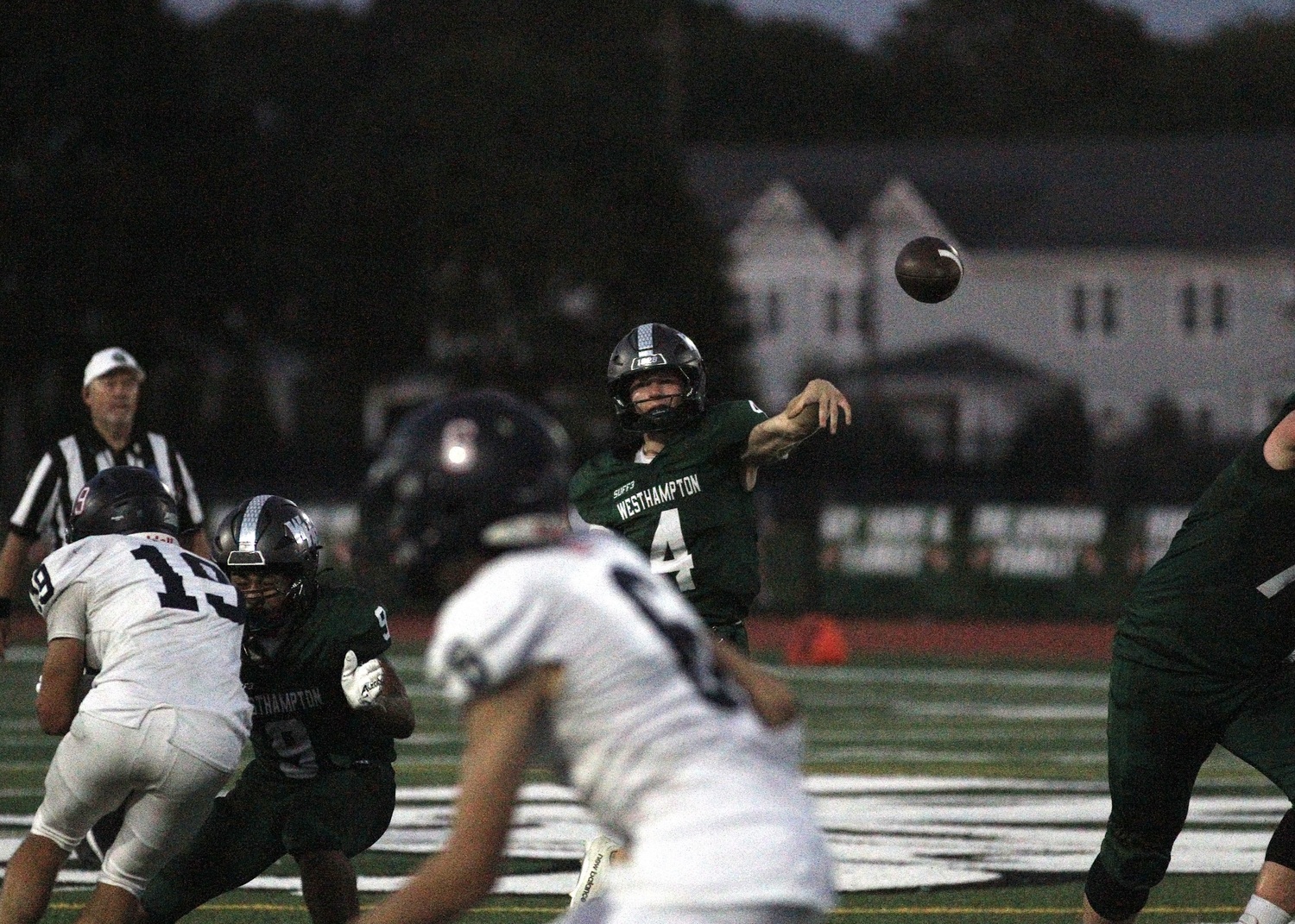 Junior quarterback Jake Calloway passes the ball downfield. DESIRÉE KEEGAN