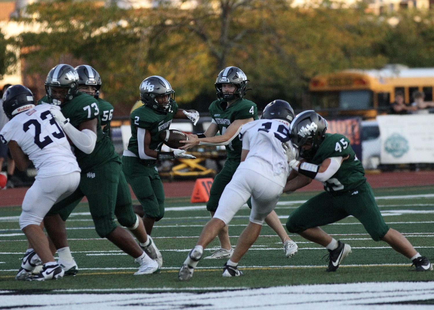 Junior wide receiver Kyle Coffey takes a handoff from junior quarterback Jake Calloway. DESIRÉE KEEGAN