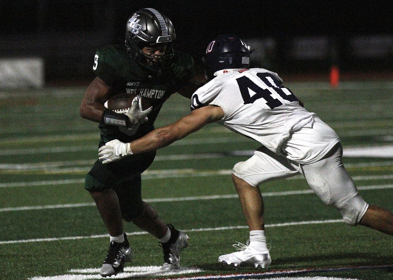 Junior running back Nic Simone carries the ball. DESIRÉE KEEGAN