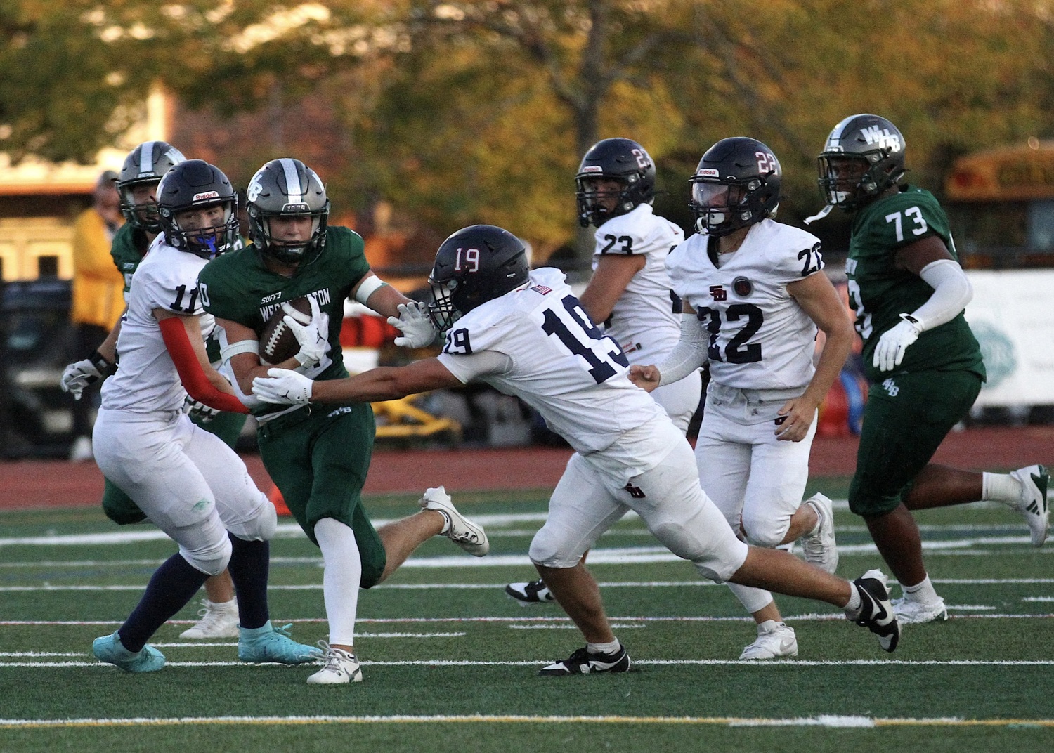Senior wide receiver Pat Fay looks to avoid a tackle. DESIRÉE KEEGAN