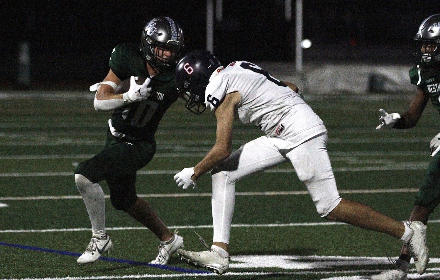 Senior wide receiver Pat Fay protects against a tackle. DESIRÉE KEEGAN