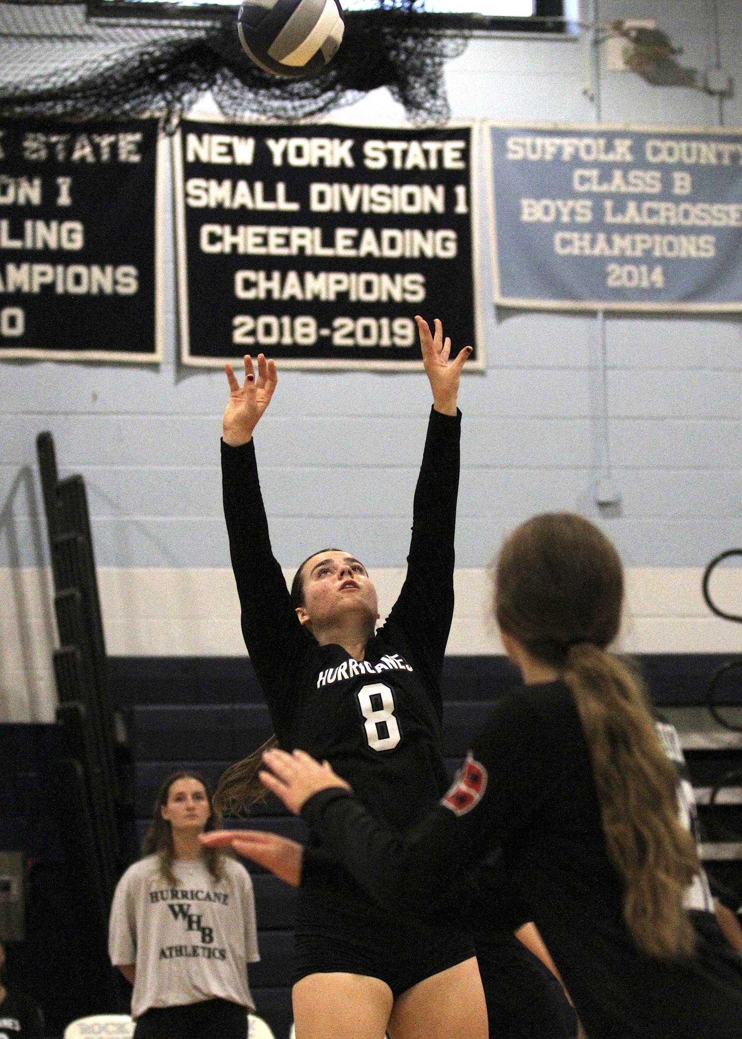 Senior setter Emma O'Came sets up a play. DESIRÉE KEEGAN