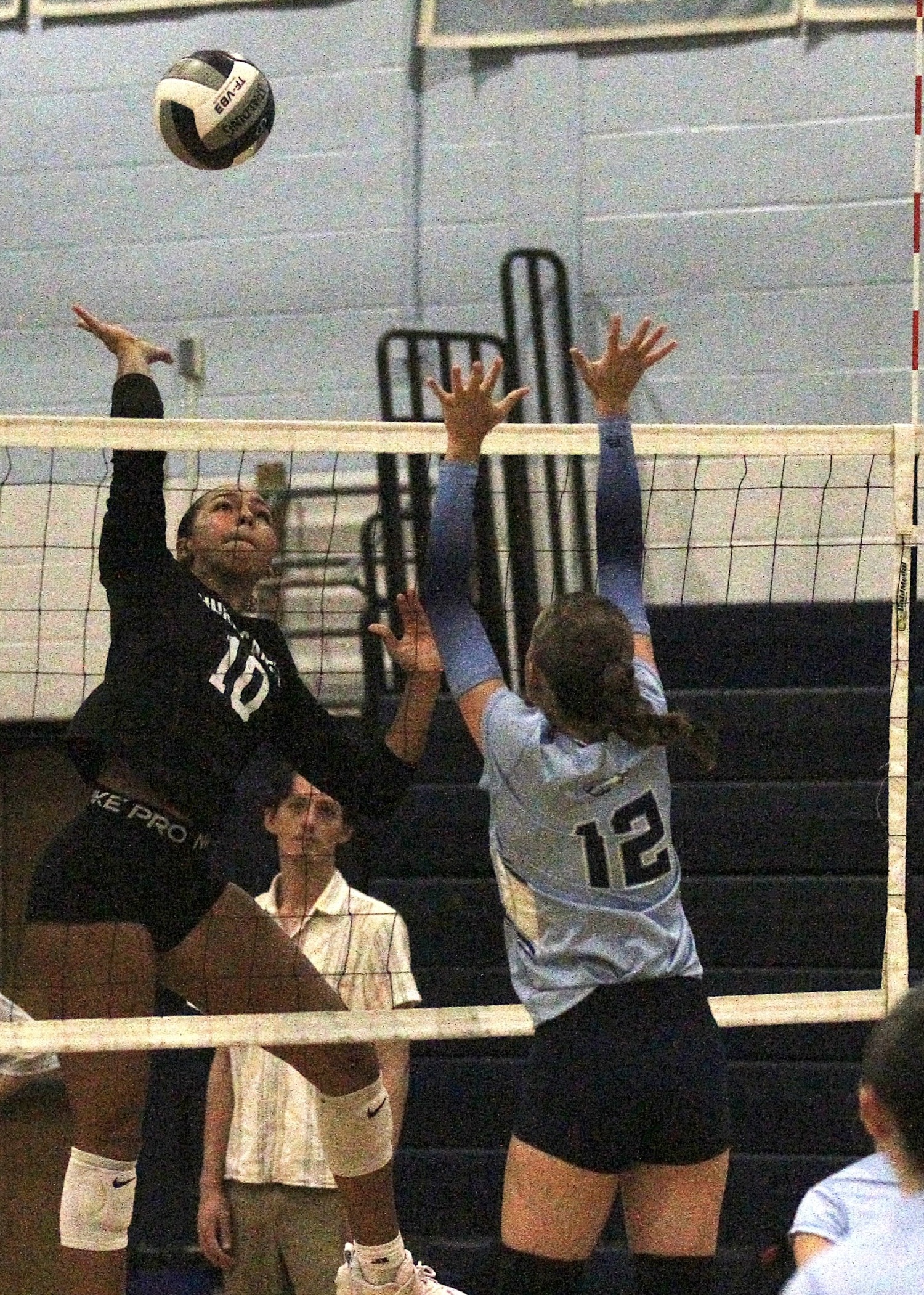 Senior middle blocker Jasmine Taylor sends over a kill. DESIRÉE KEEGAN