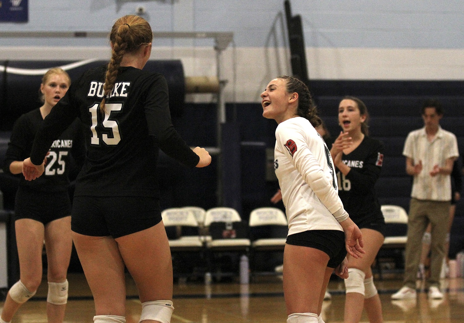 Junior libero Lila Davin screams in celebration. DESIRÉE KEEGAN