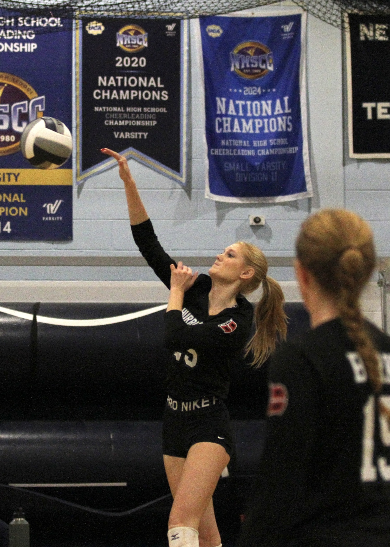 Senior right side Mia Hill spikes the ball. DESIRÉE KEEGAN
