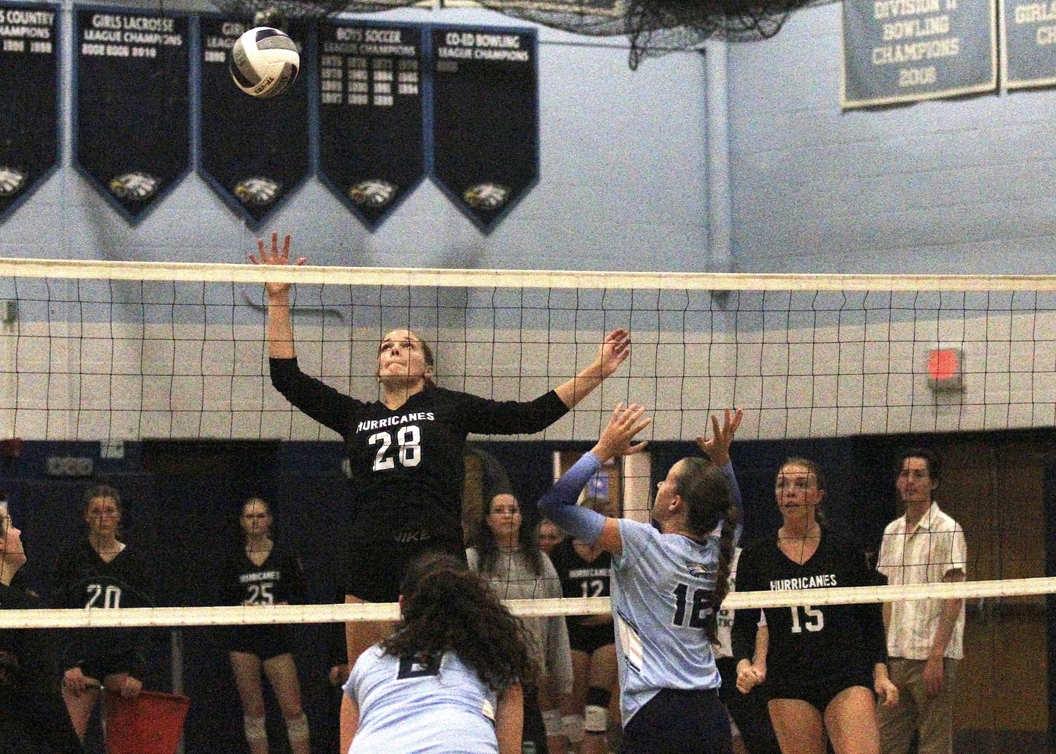 Sophomore middle blocker Reilly Maloney goes for the kill. DESIRÉE KEEGAN
