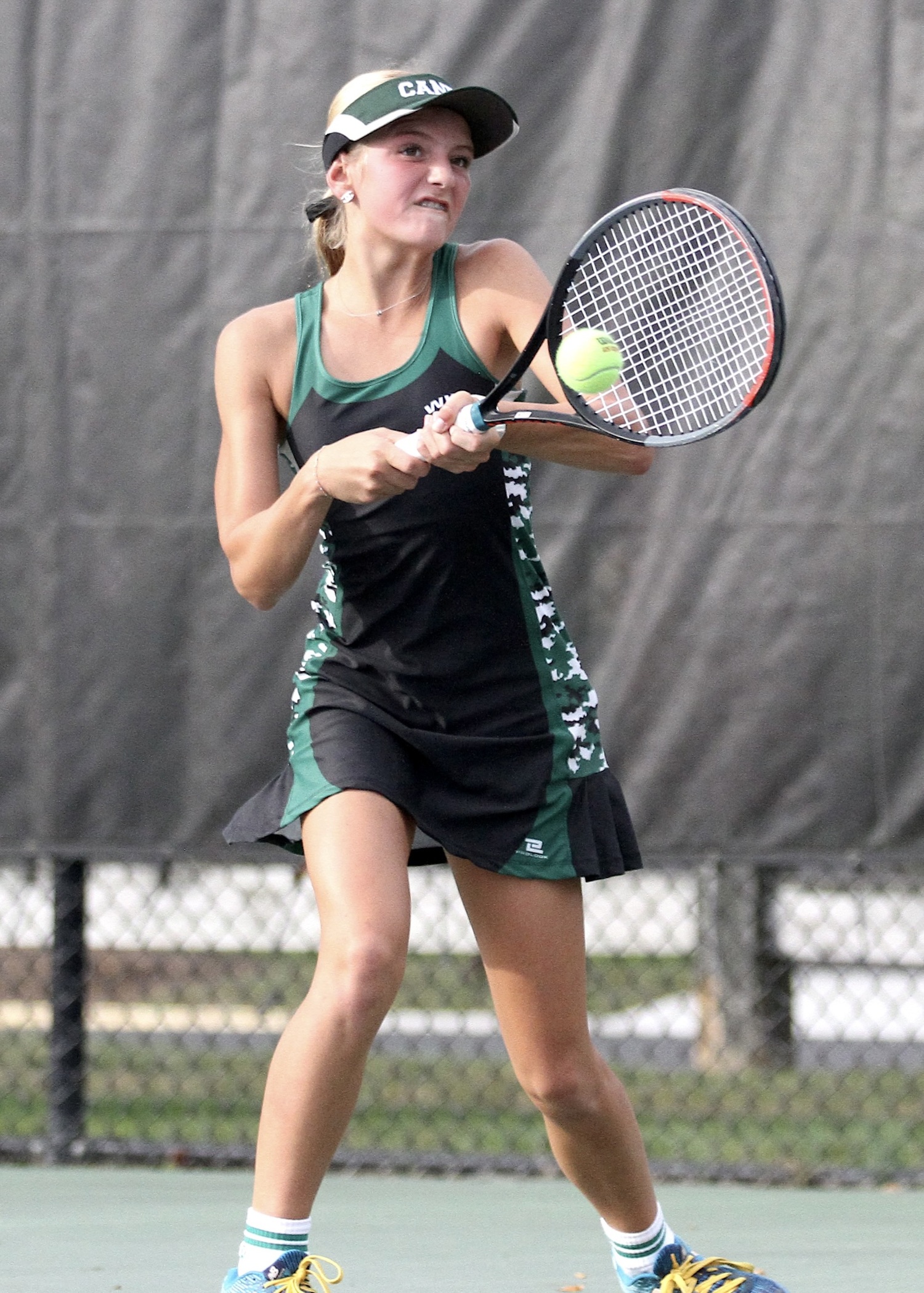 Seventh-grader Riley Magner slams the ball. DESIRÉE KEEGAN